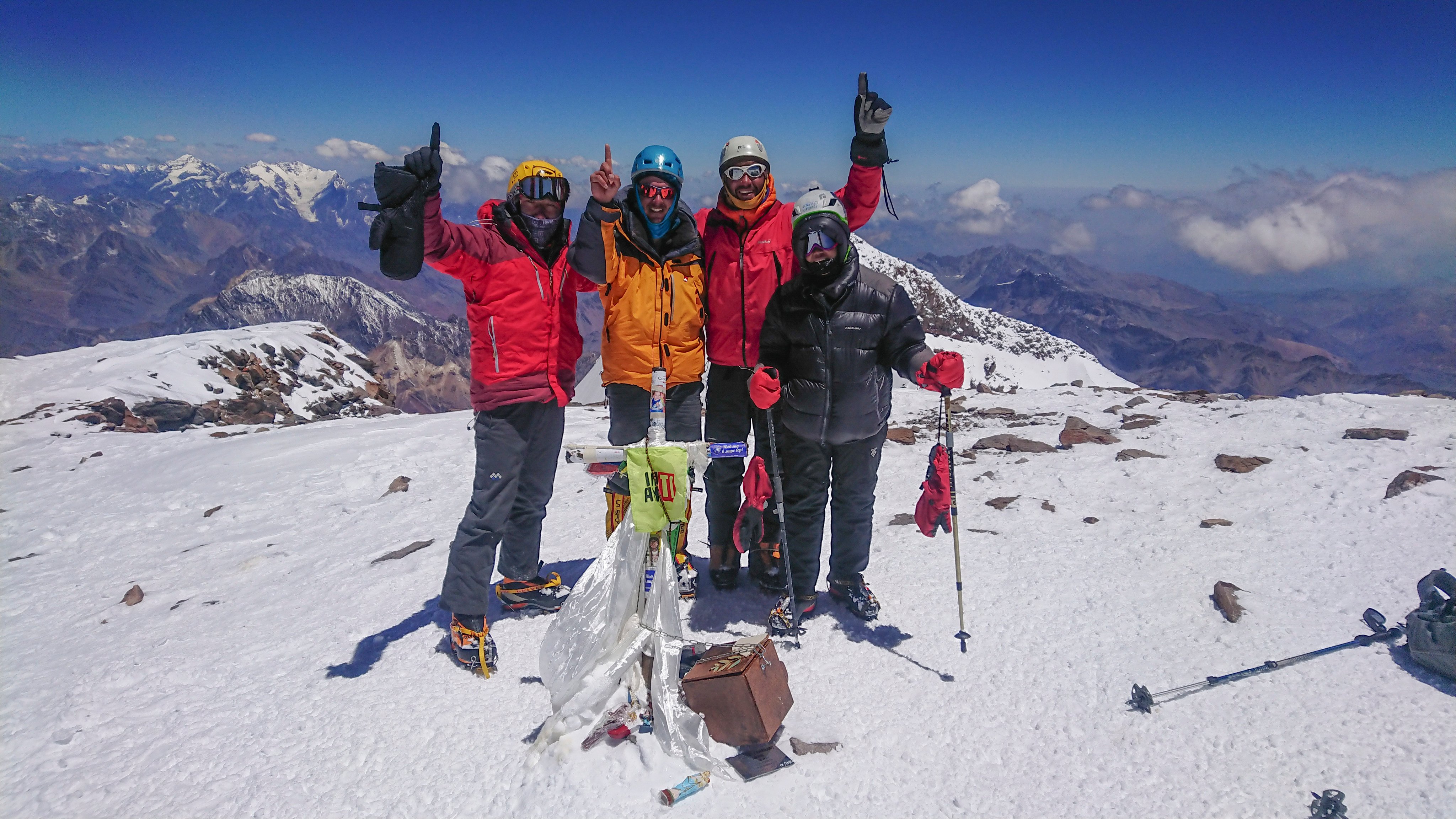 A group celebrate reaching the summit of Mount Aconcagua. Photo: Carina Dayondon