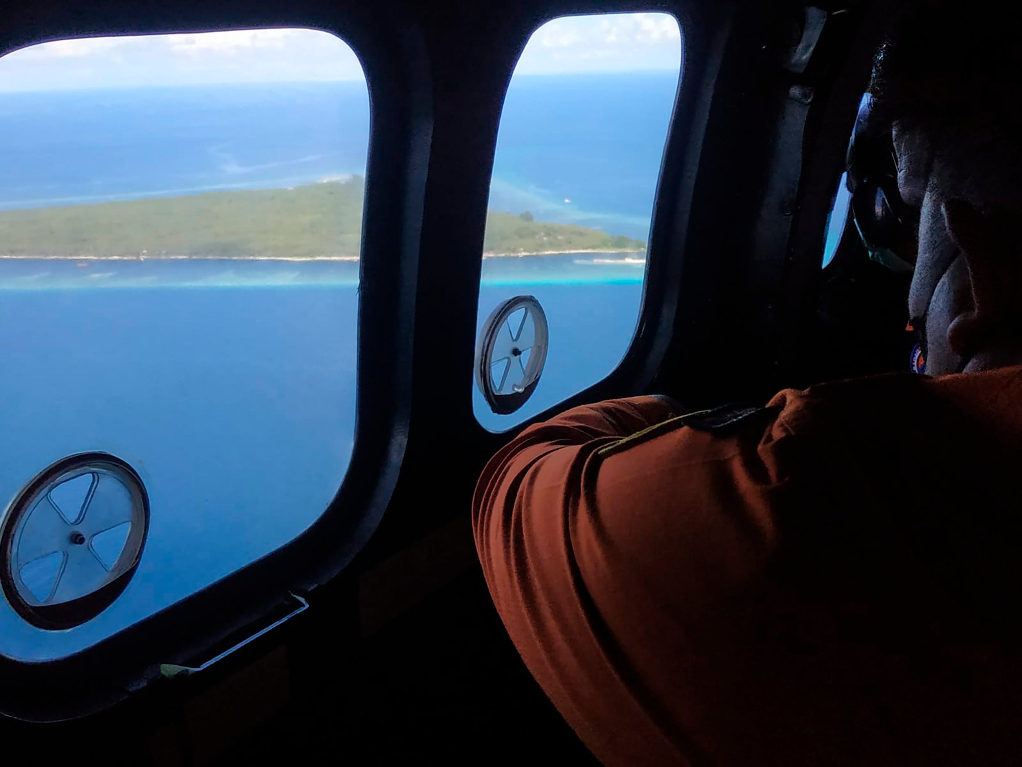Rescuers search for a number of people missing after the ferry, KM Ladang Pertiwi 02, sank in bad weather near Sulawesi Island. Photo: BASARNAS Sulawesi Selatan via AP