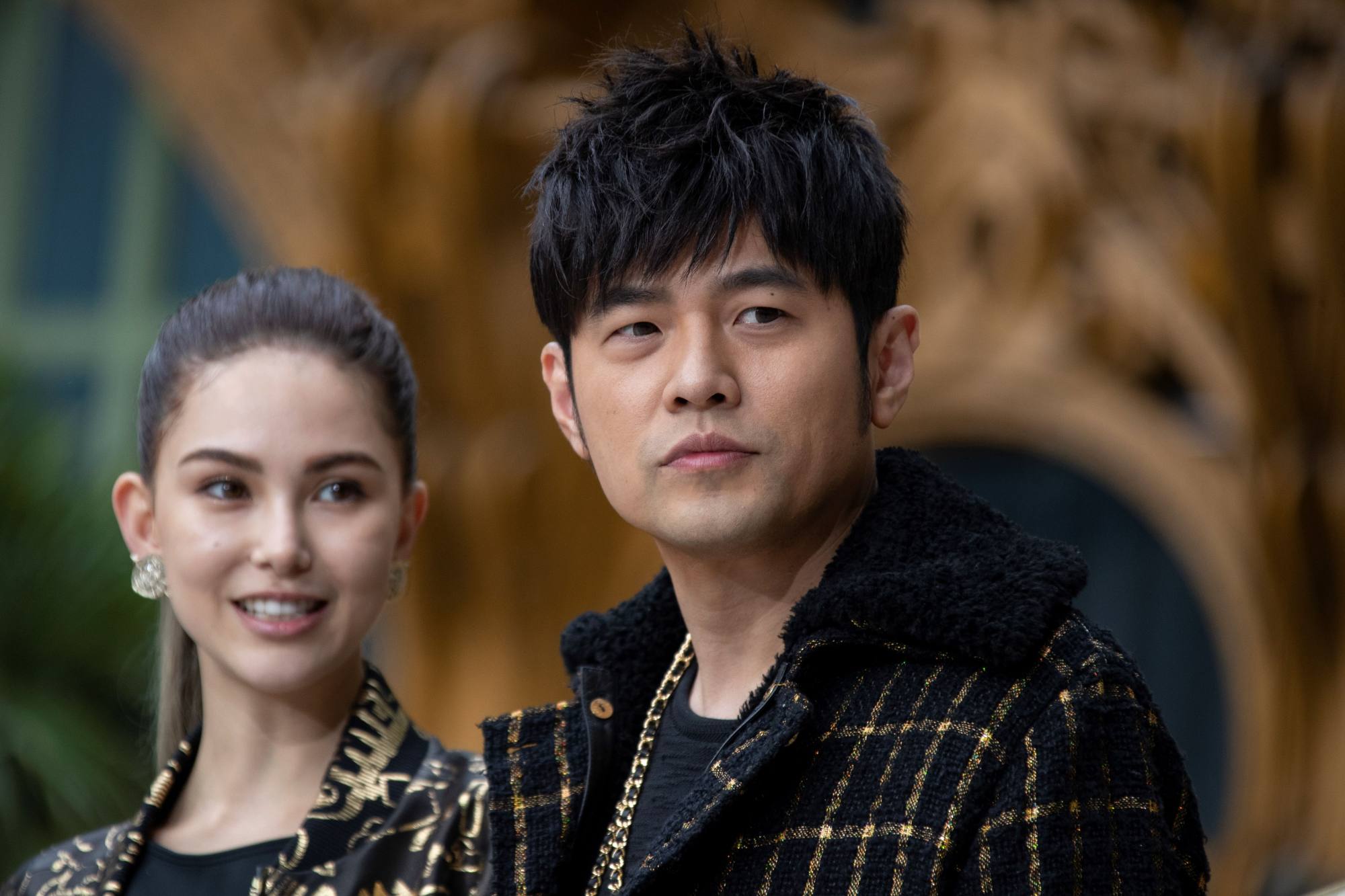 Taiwanese actress and model Hannah Quinlivan and husband, Taiwanese singer Jay Chou, pose prior to a Chanel fashion show in Paris. Chou recently appeared in two concerts on WeChat. Photo: AFP