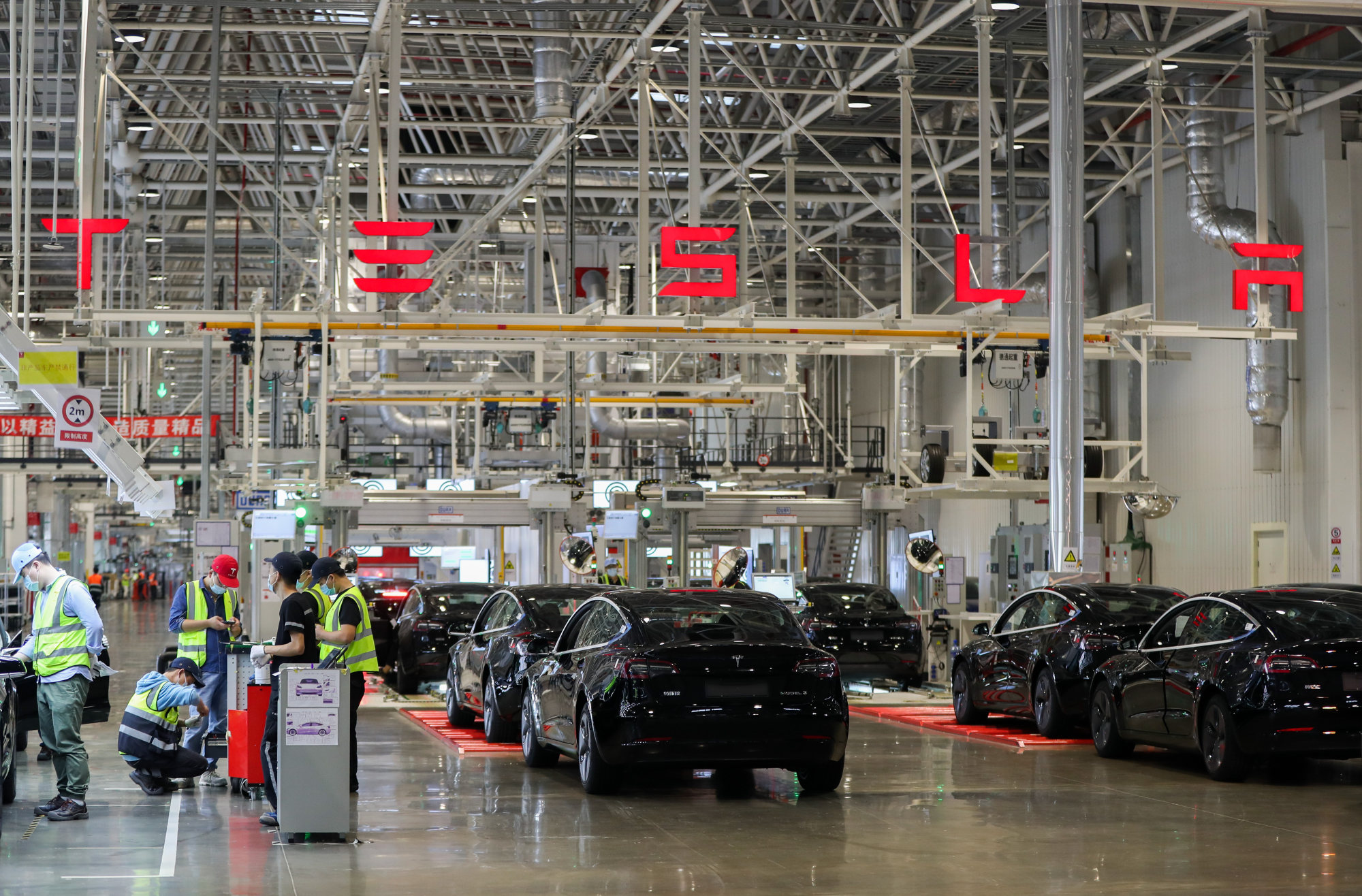 The Tesla Gigafactory in Shanghai. Large manufacturing sites, such as Tesla’s, will still require workers to live in bubbles for a while. Photo: Xinhua