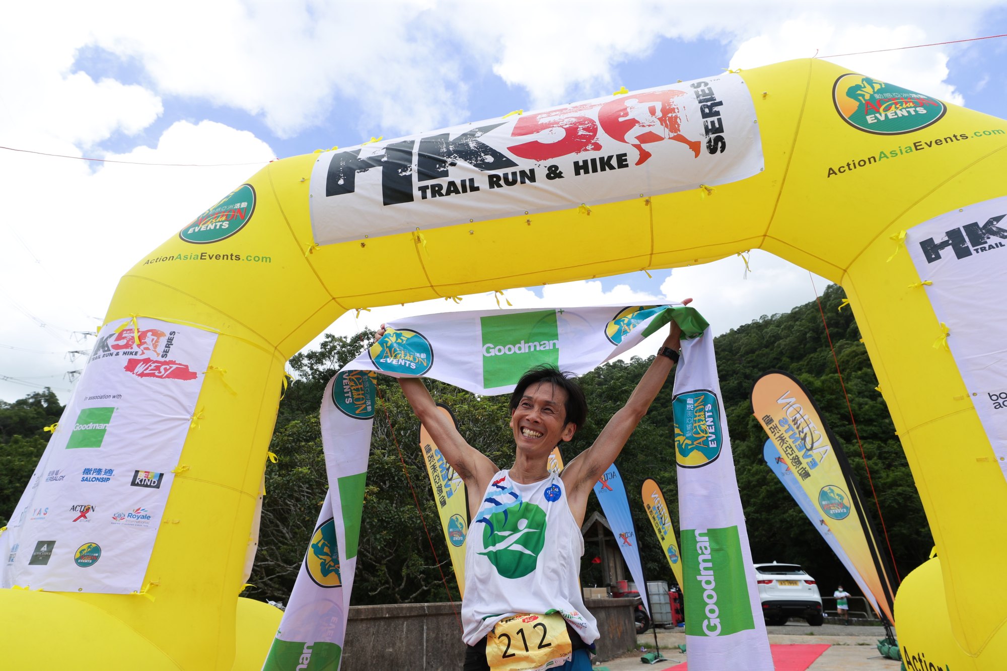 HK50 West men’s winner Masashi Shirotake of Japan celebrates at the finish line.
