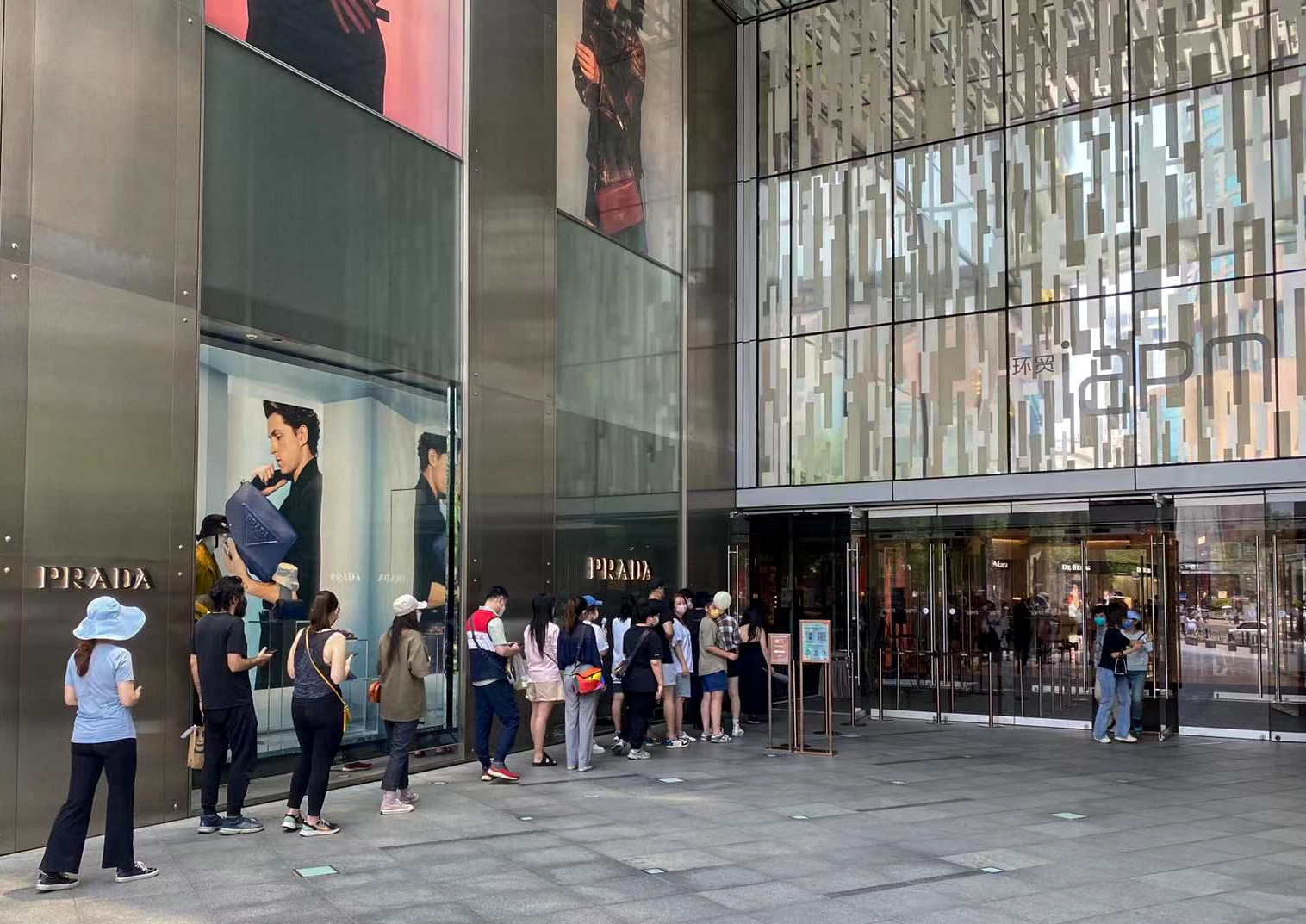 Shanghai residents are seen lining up outside a luxury boutique at Sun Hung Kai Properties’ Shanghai IFC Mall on June 1, 2022, as the city reopens after a two-month lockdown. Photo: Handout