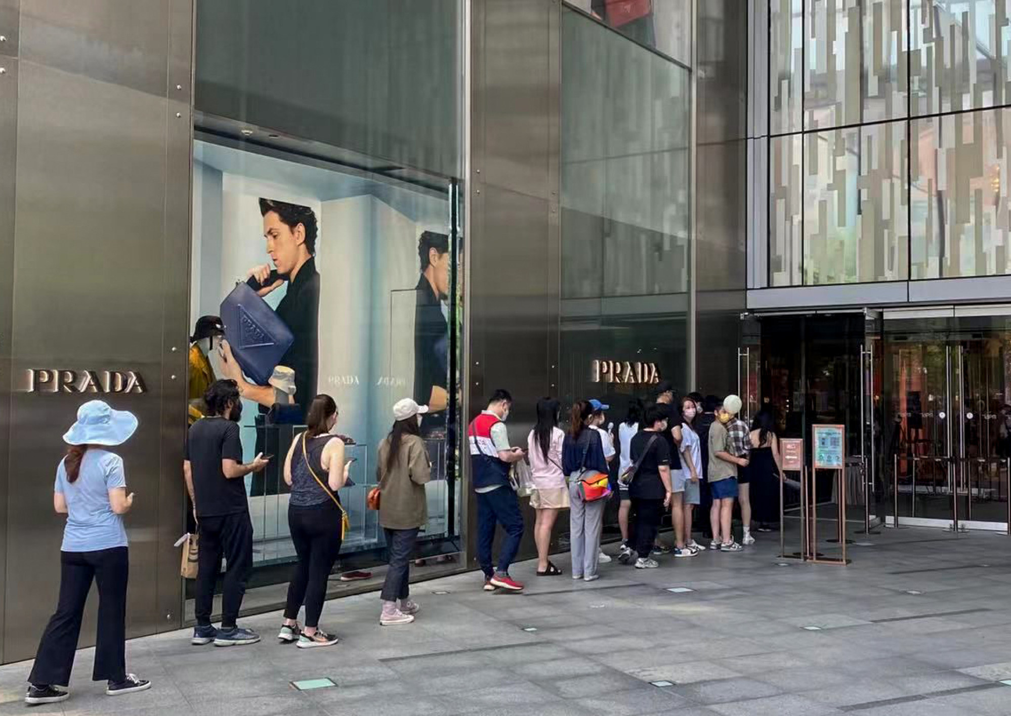 Shoppers Queue Outside Louis Vuitton Store Editorial Stock Photo - Stock  Image