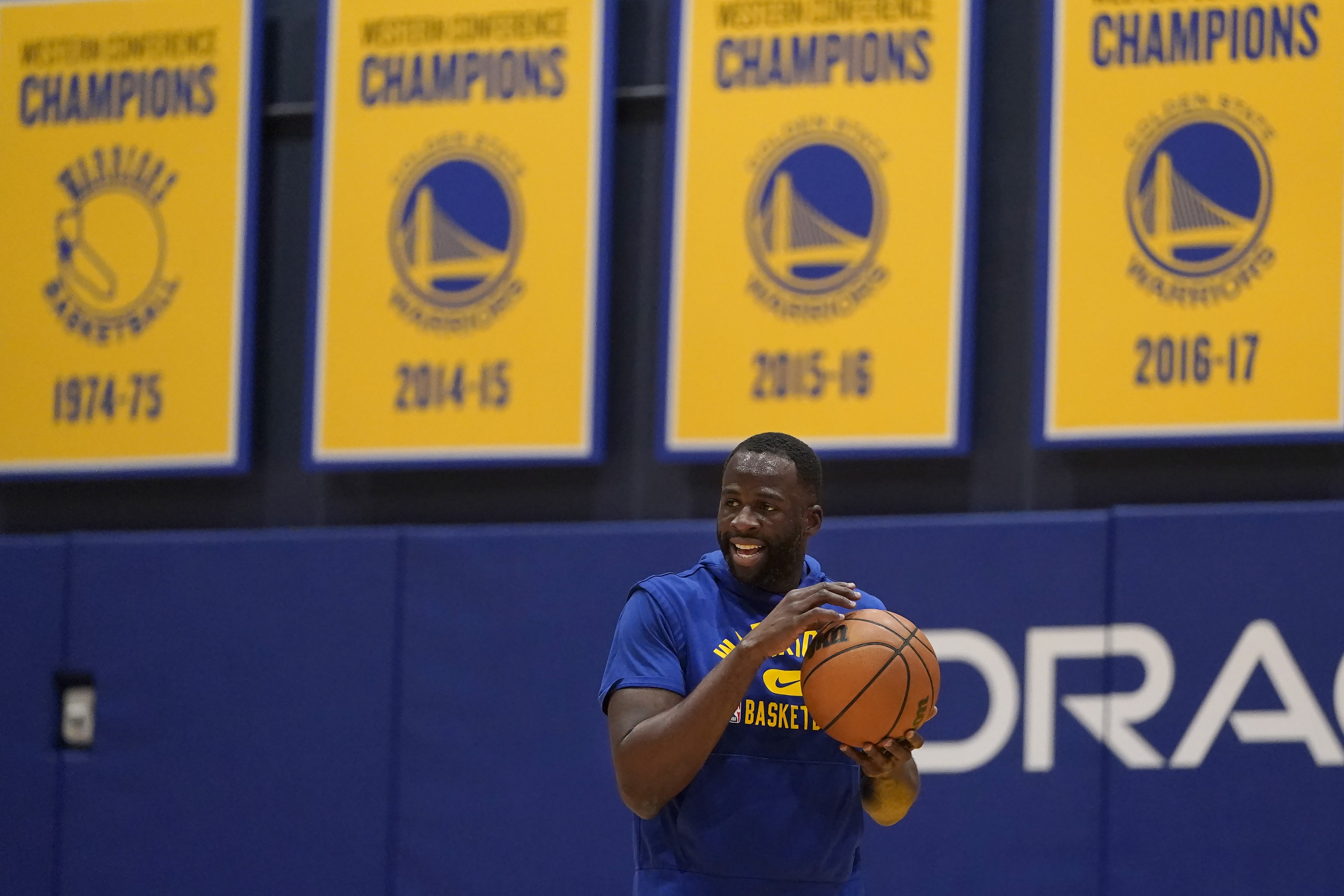 Golden State Warriors forward Draymond Green holds onto the ball during a practice session in San Francisco. Photo: AP