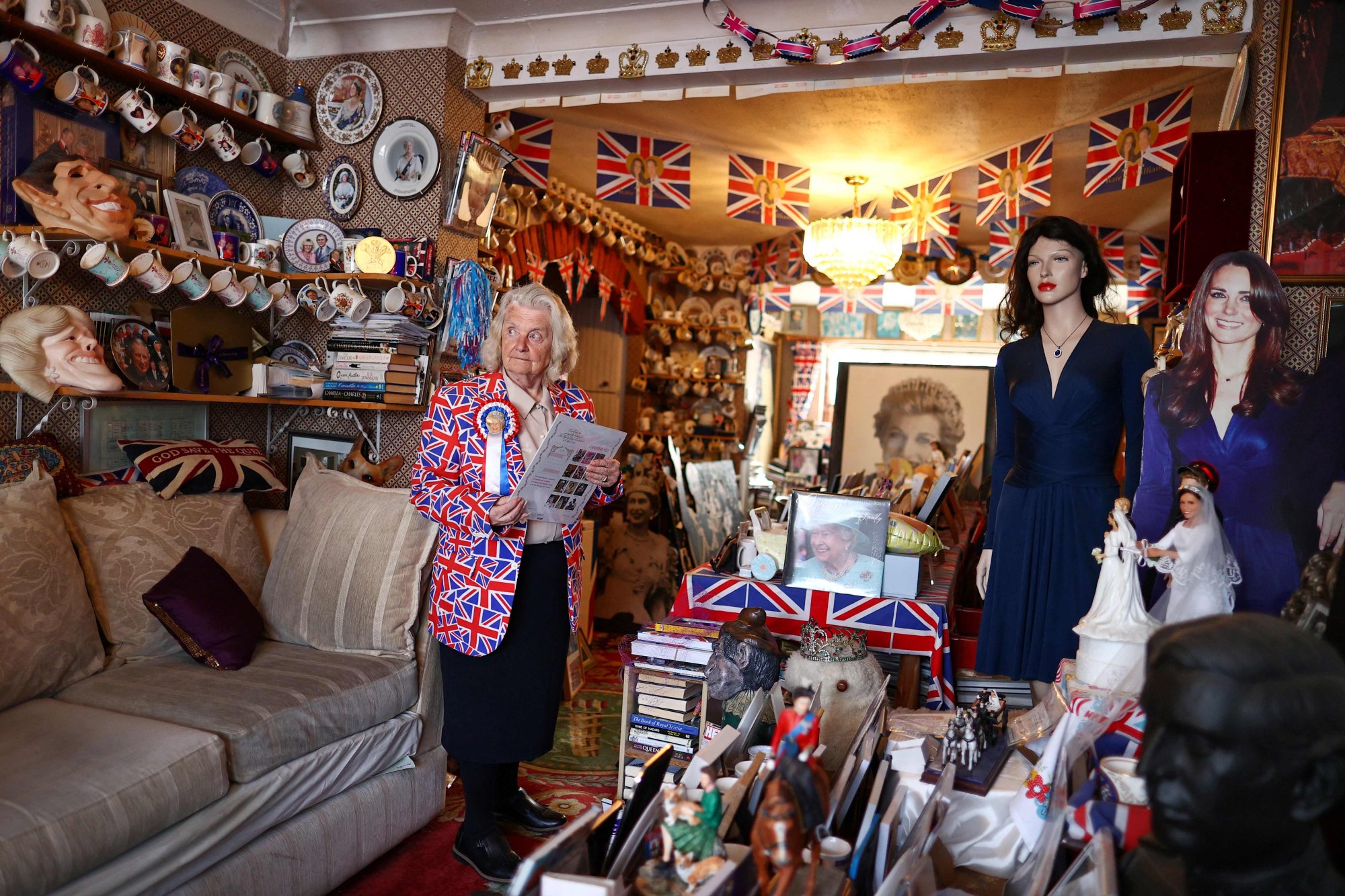 Tyler stands among her collection of Royal memorabilia in her living room. Photo: AFP