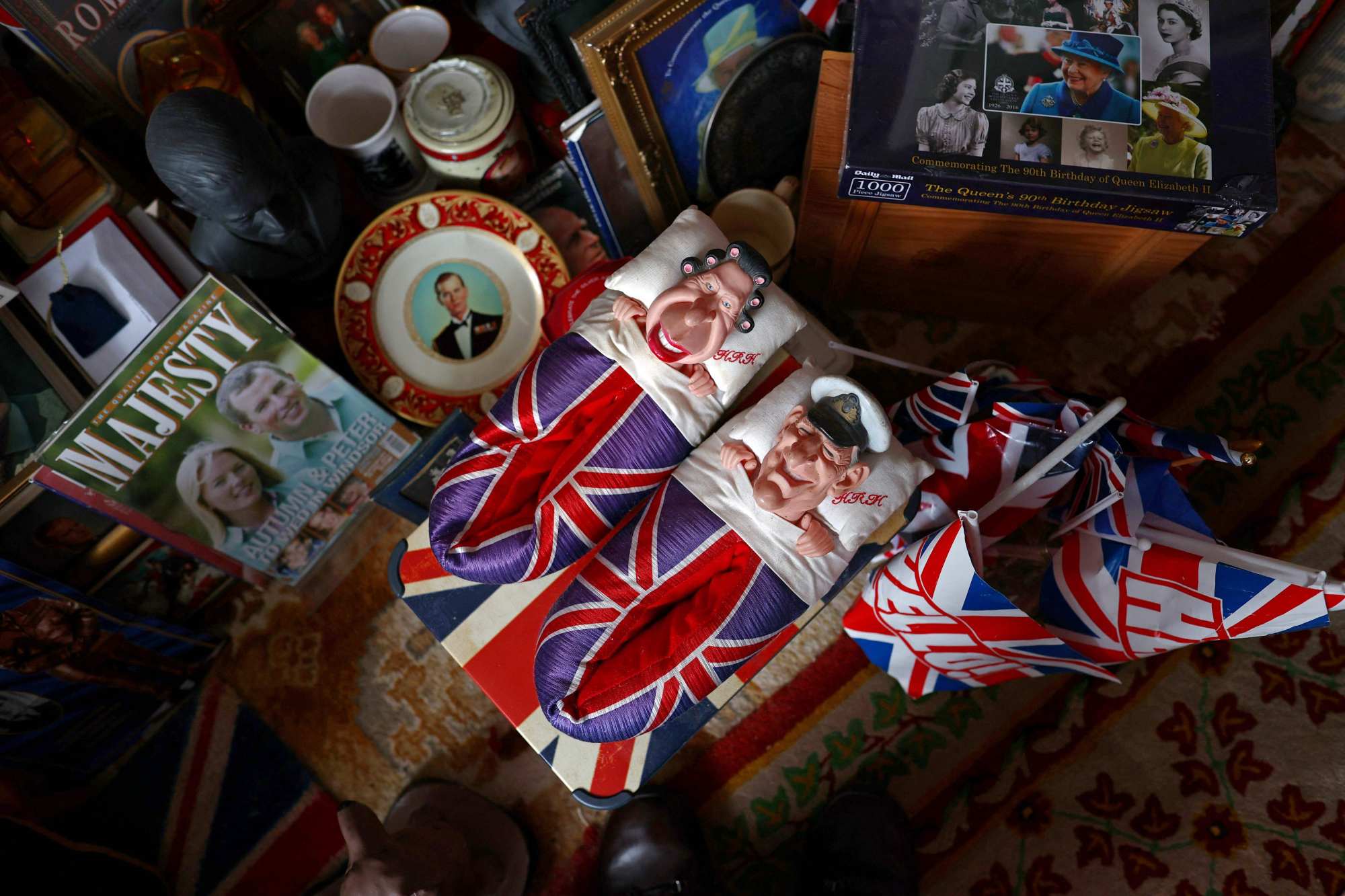 A pair of slippers featuring the queen and the Duke of Edinburgh. Photo: AFP