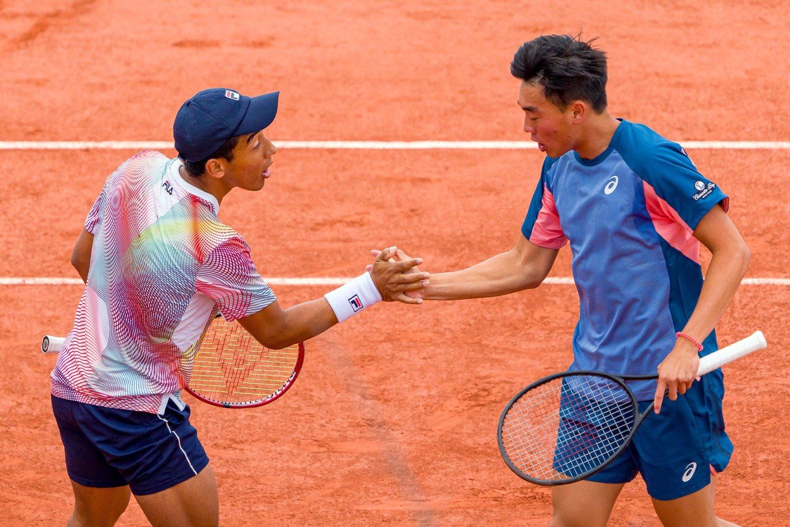 Reigning Australian Open junior champions Bruno Kuzuhara and Coleman Wong. Photo: Arck Images