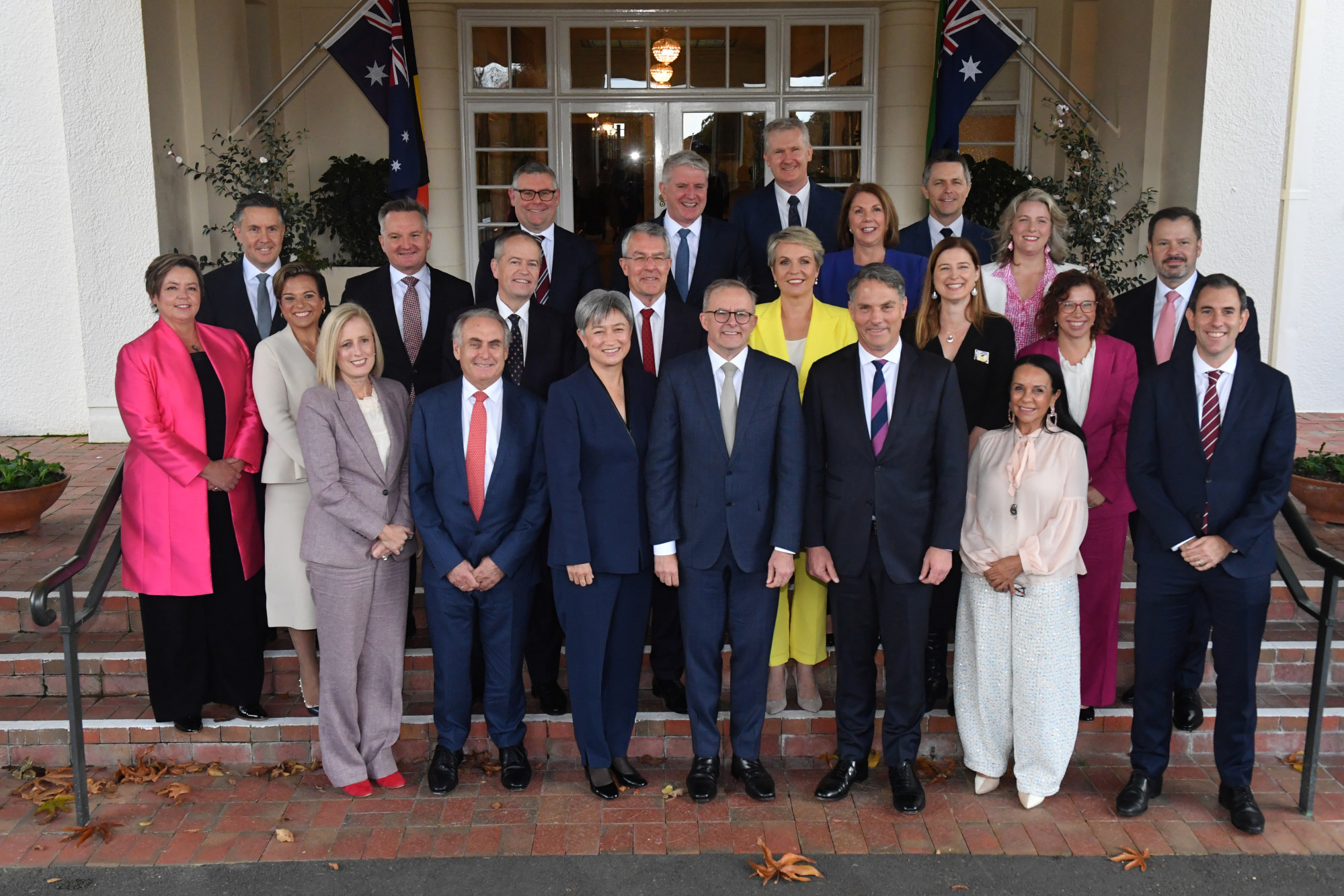Australian PM Anthony Albanese and his cabinet pose for photos after a swearing-in ceremony at the Government House in Canberra. Photo: AAP/dpa