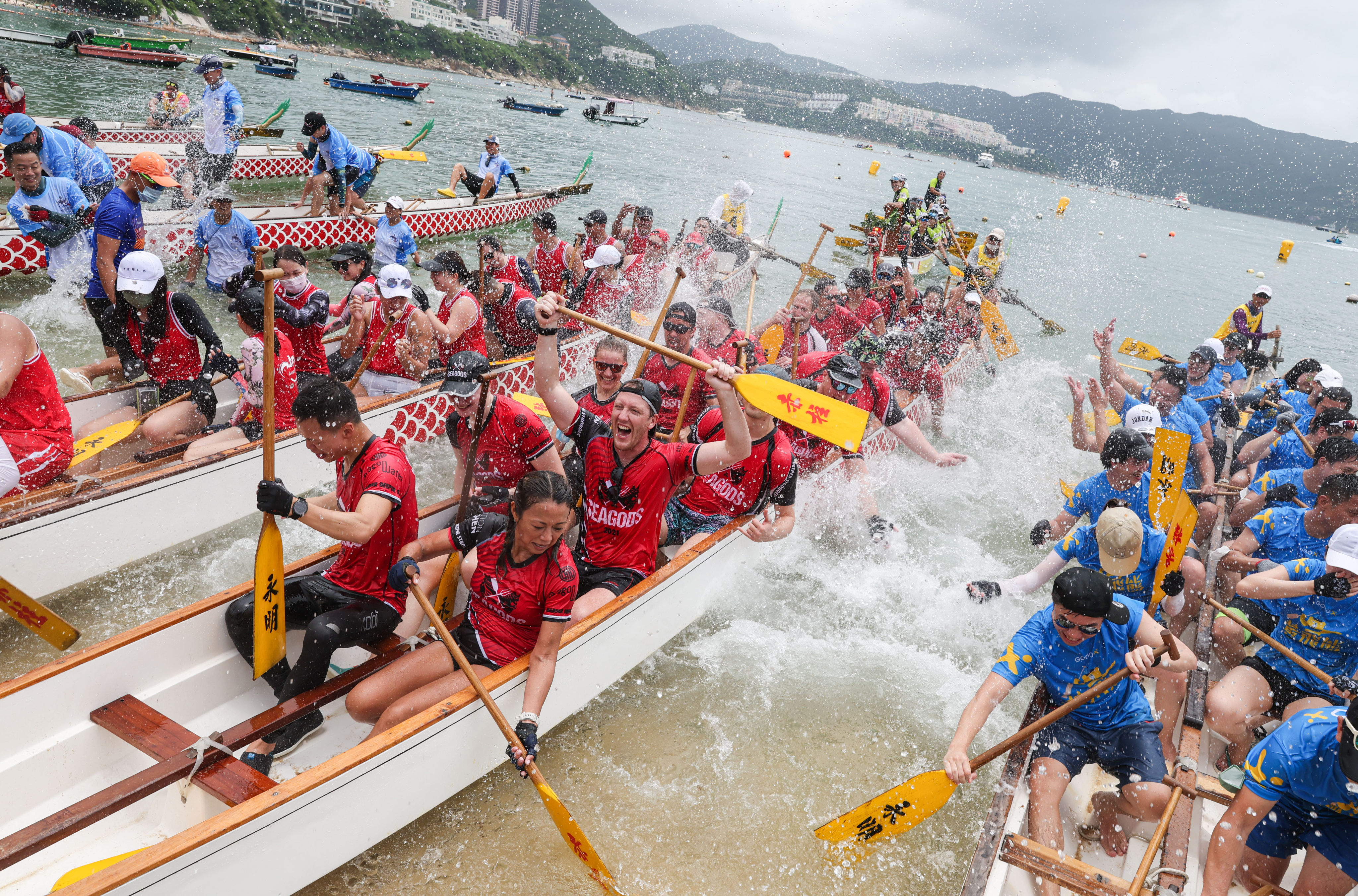 Participants kick up a splash at Stanley beach. Photo: Yik Yeung-man