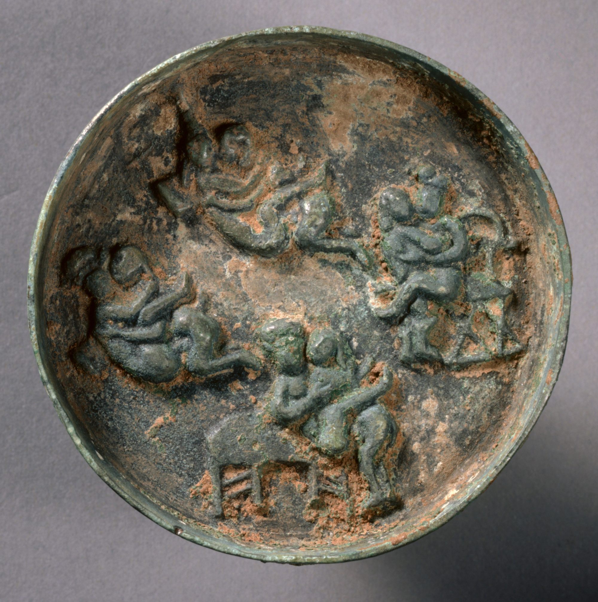 A bronze Chinese artefact from the late 13th century to mid-14th century showing various sex positions. Photo: Getty Images