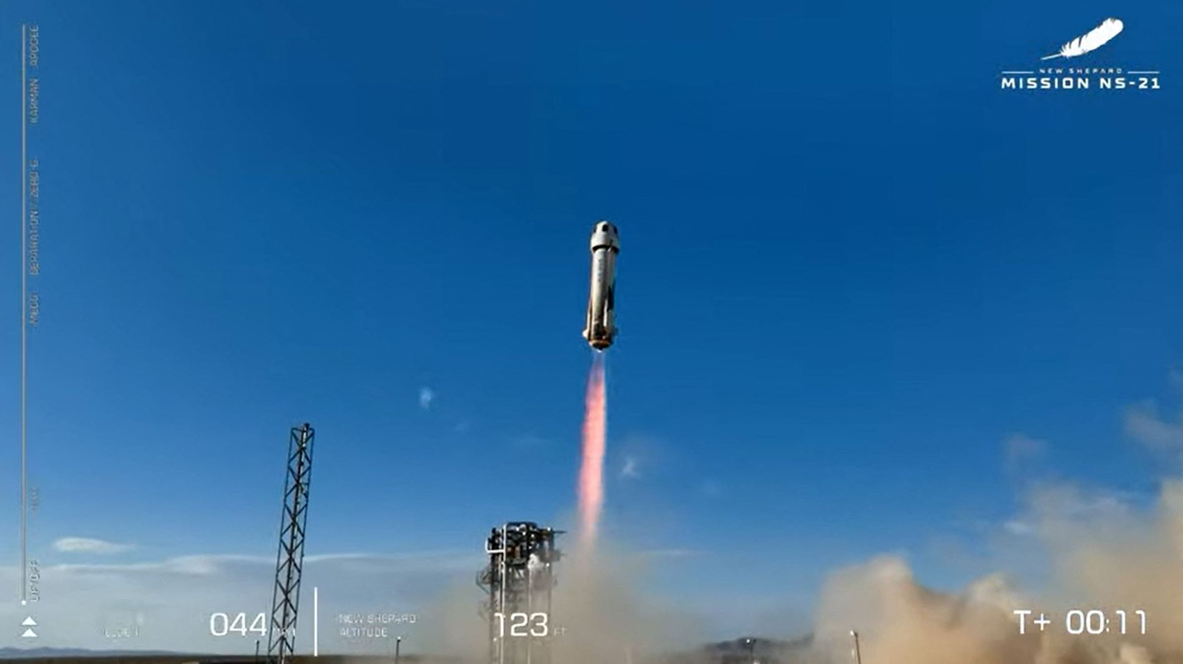 The Blue Origin New Shepard rocket launches from West Texas on Saturday June 4. Photo: AFP