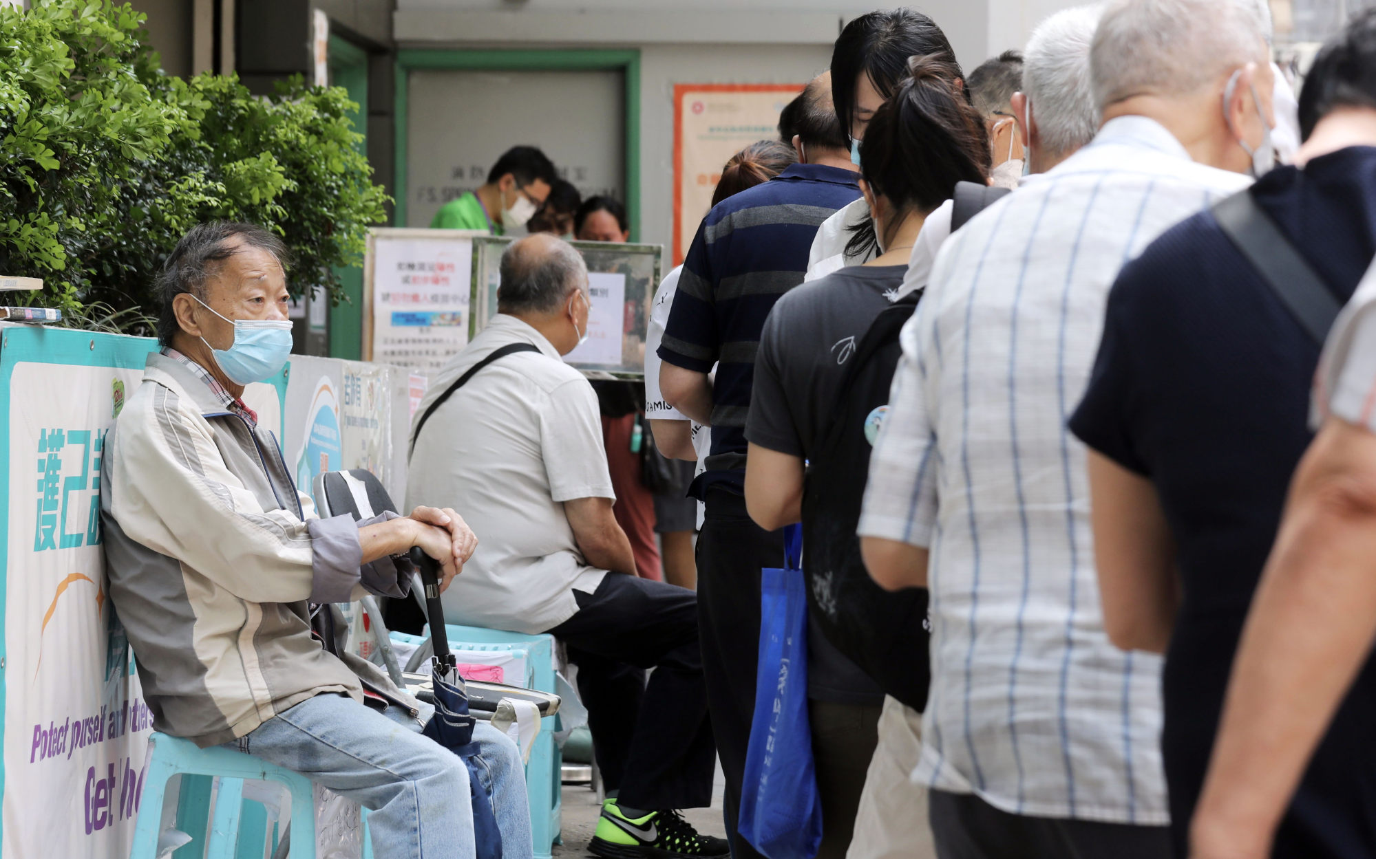 Residents queue up for Covid-19 vaccines at in Hong Kong’s Jordan neighbourhood. Photo: Xiaomei Chen