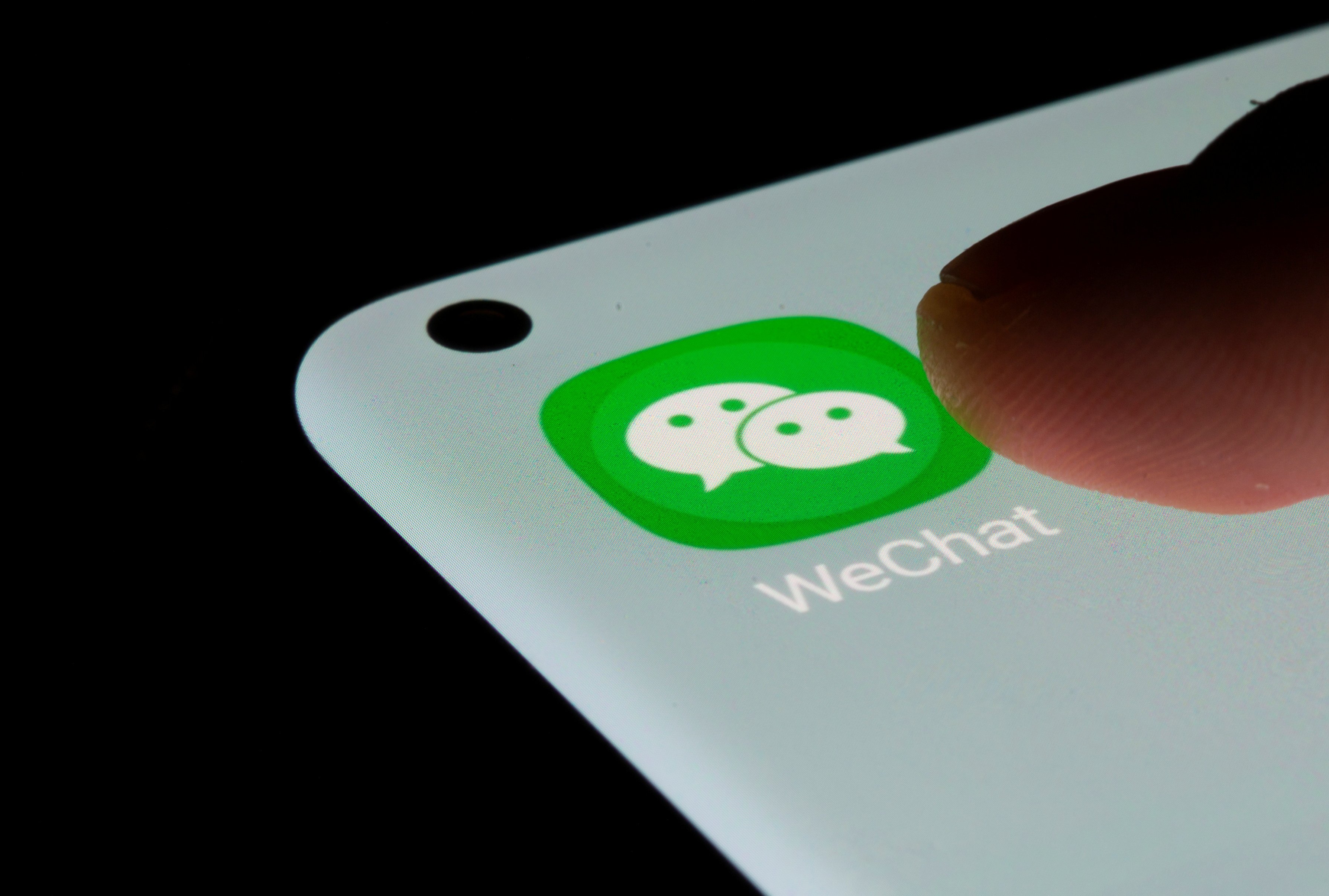 The hotline will support reporting by WeChat. Photo: Reuters