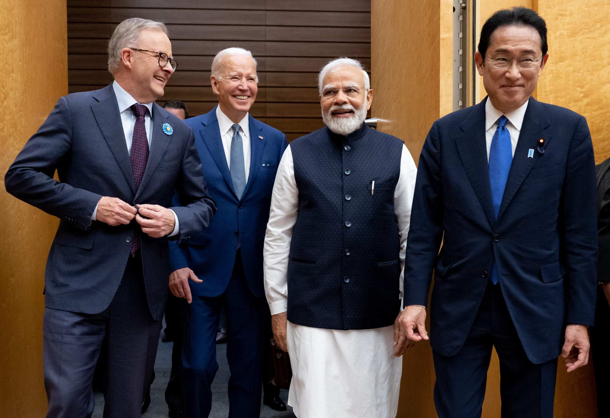 (From left) Australian Prime Minister Anthony Albanese, US President Joe Biden, Indian Prime Minister Narendra Modi, and Japanese Prime Minister Kishida Fumio arrive for the Quad Leaders Summit in Tokyo on May 24. Photo: AFP