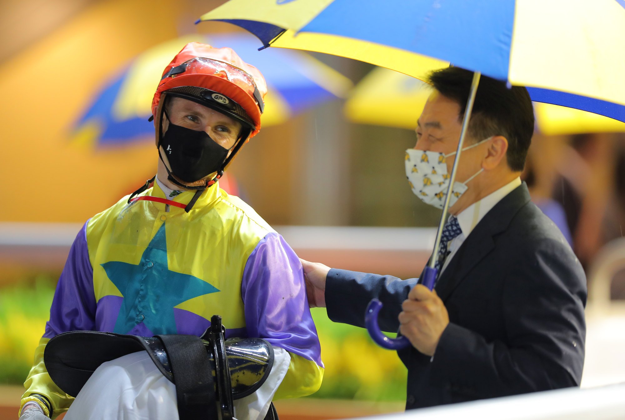 Trainer Ricky Yiu and jockey Lyle Hewitson chat through the victory of Soulmate at Happy Valley.