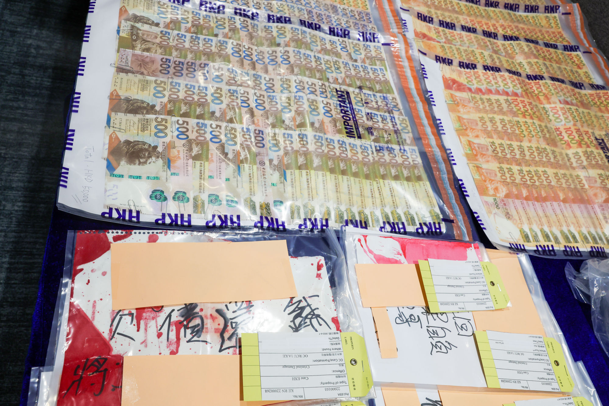 Police also seized more than HK$700,000 in cash and a large quantity of documents such as loan applications. Photo: Edmond So
