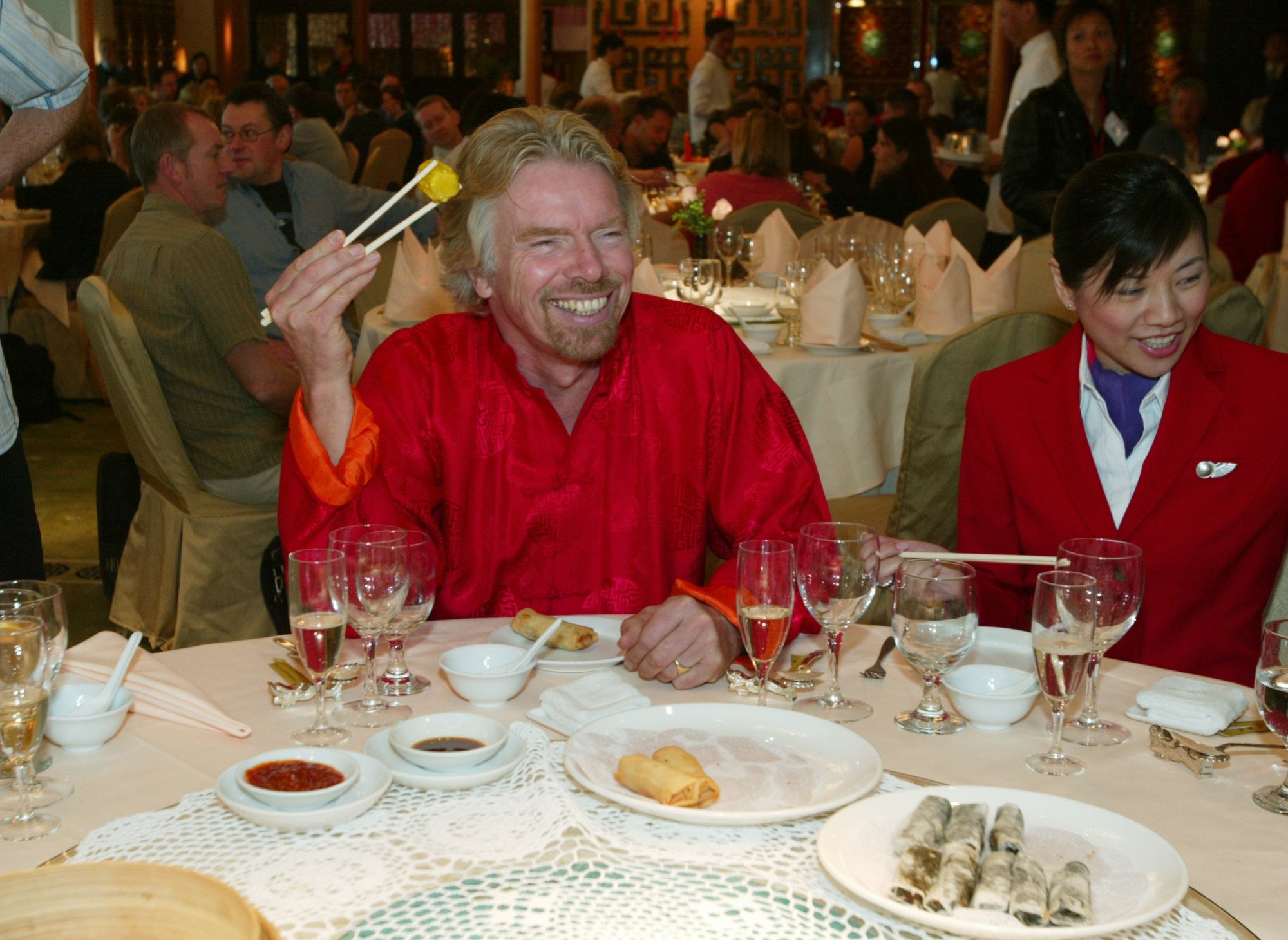 Richard Branson, chairman of Virgin Atlantic Airways, enjoys dim sum at the Jumbo Floating Restaurant, Aberdeen, in 2004. Photo: SCMP