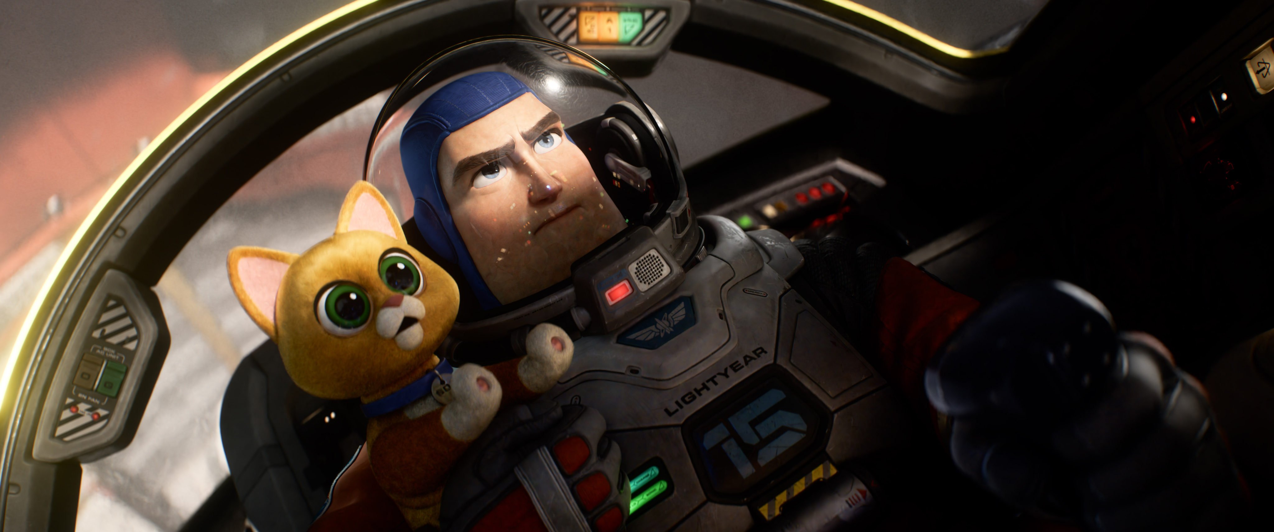 Buzz Lightyear (voiced by Chris Evans) and robot companion cat Sox (Peter Sohn) in a still from Lightyear. Photo: Disney/Pixar