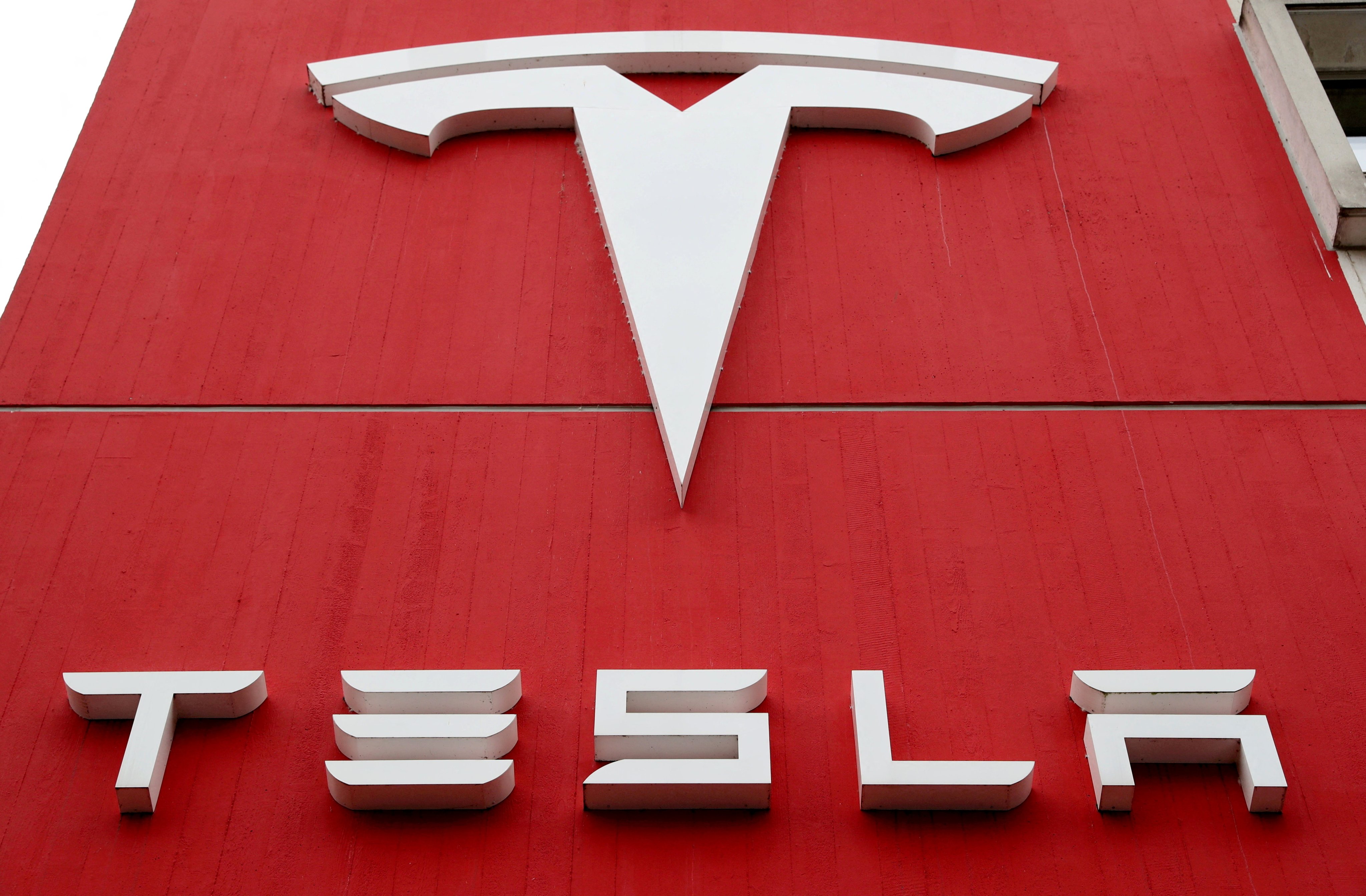 The logo of electric car manufacturer Tesla seen at a branch office in Bern, Switzerland, on October 28, 2020. Photo: Reuters
