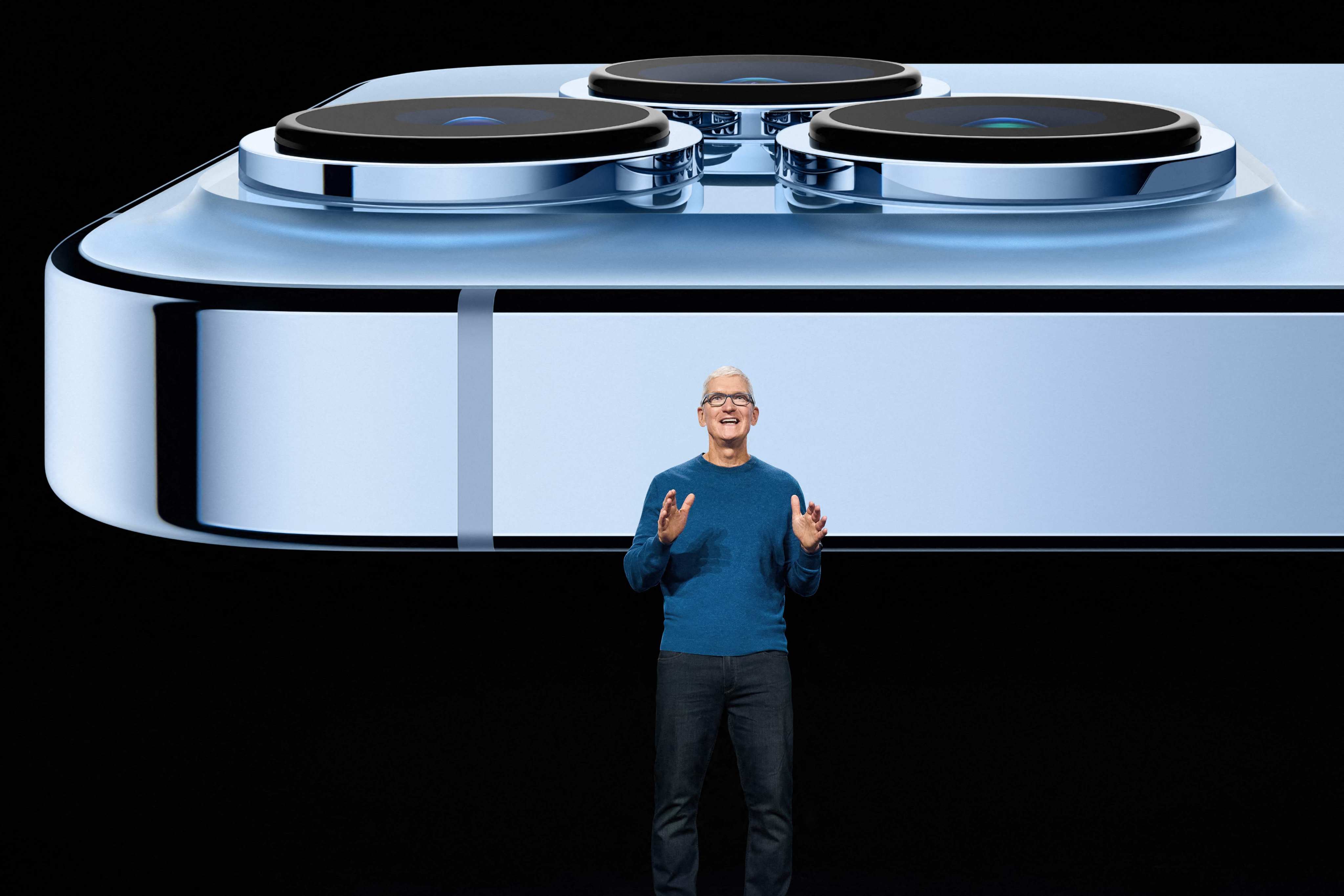Apple CEO Tim Cook showcases the advanced camera system on the new iPhone 13 Pro in September 2021. Photo: Apple Inc/ AFP
