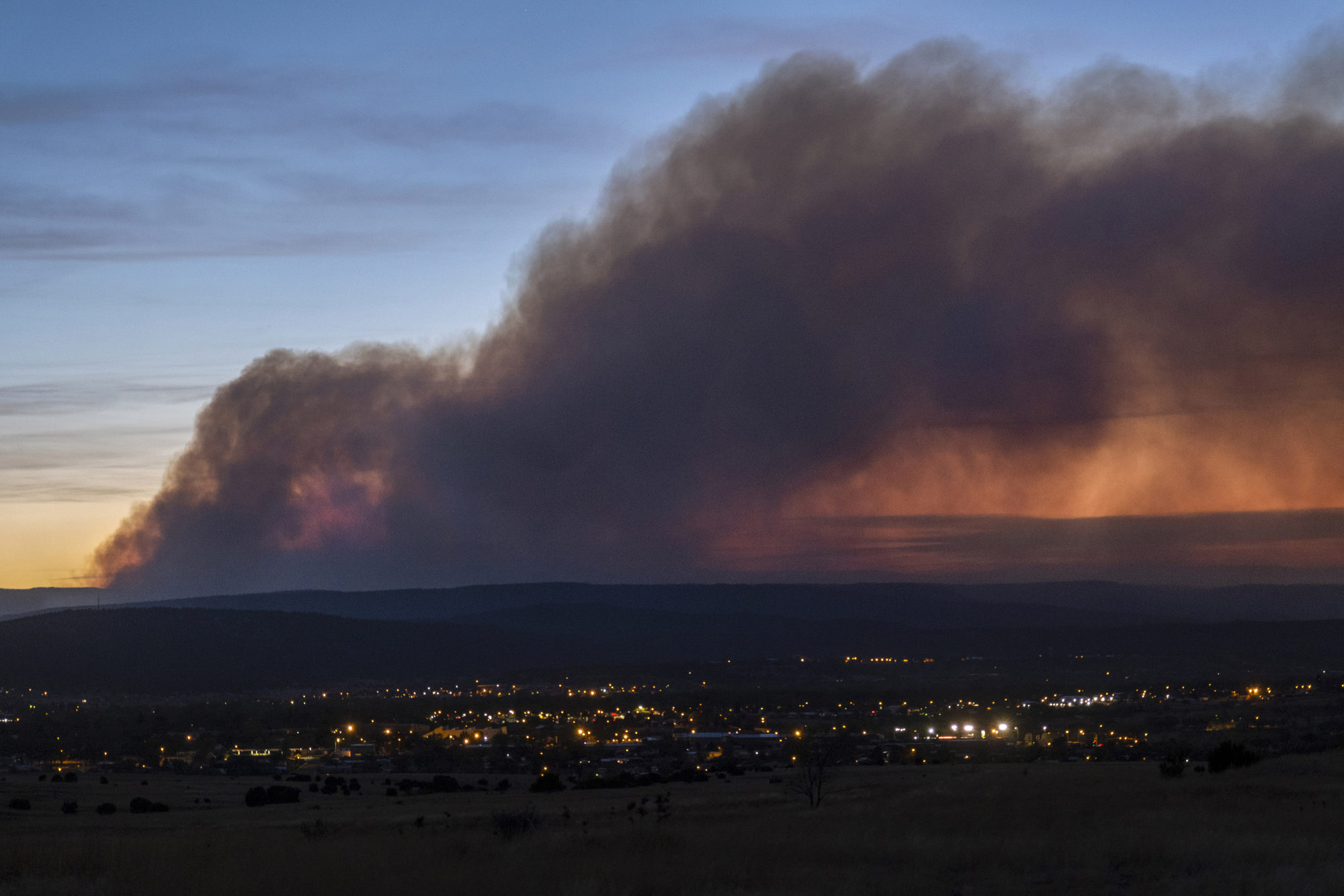 Smoke from the Calf Canyon/Hermit Peak Fire drifts over Las Vegas, New Mexico on May 7. Photo: The Albuquerque Journal via AP
