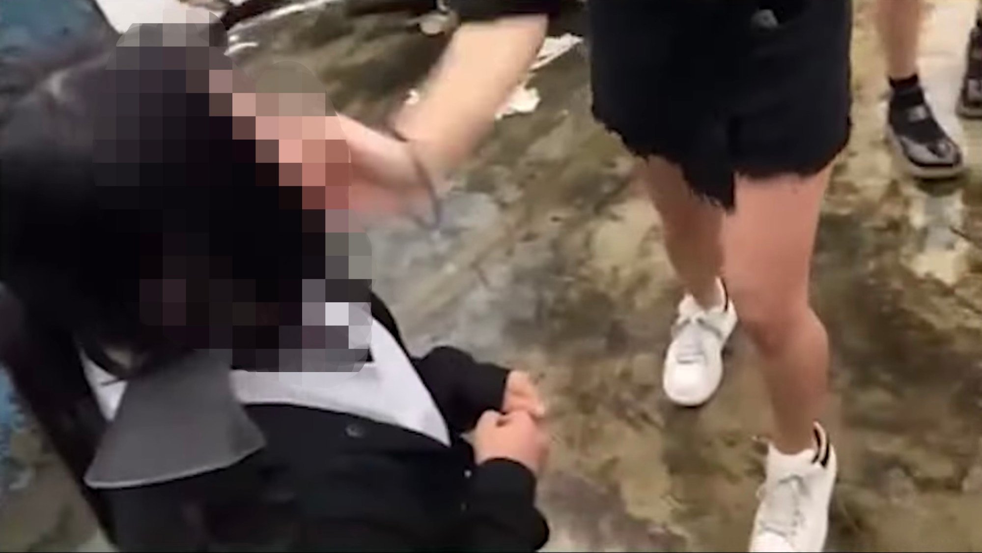 Screenshot of a video that went viral showing a 12-year-old girl being slapped in the face. Photo: Handout