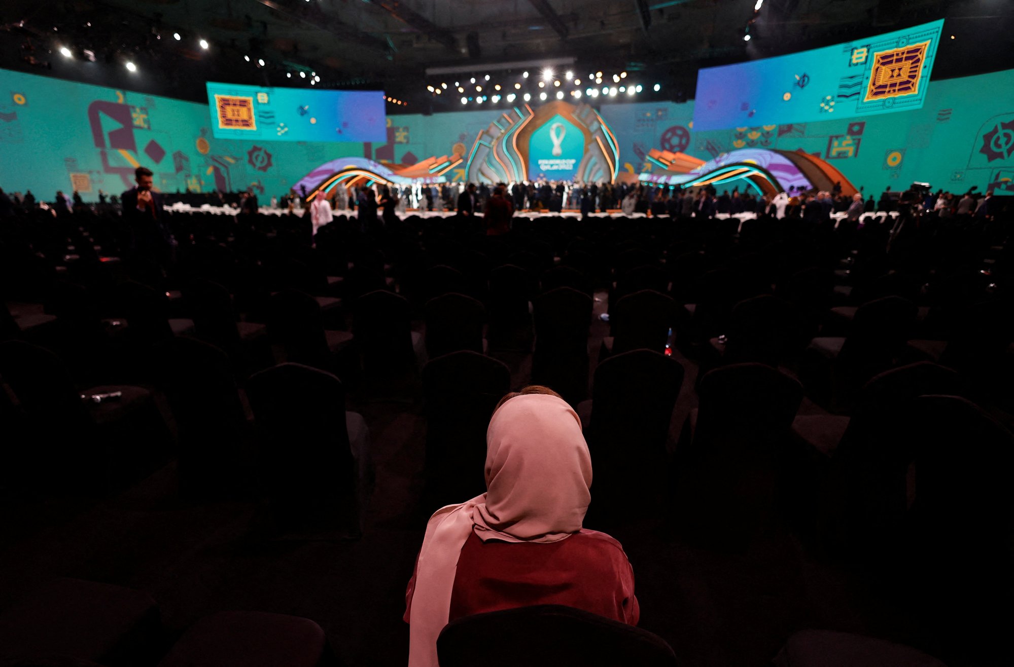 A spectator watches the draw for the World Cup finals in Doha. Photo: Reuters