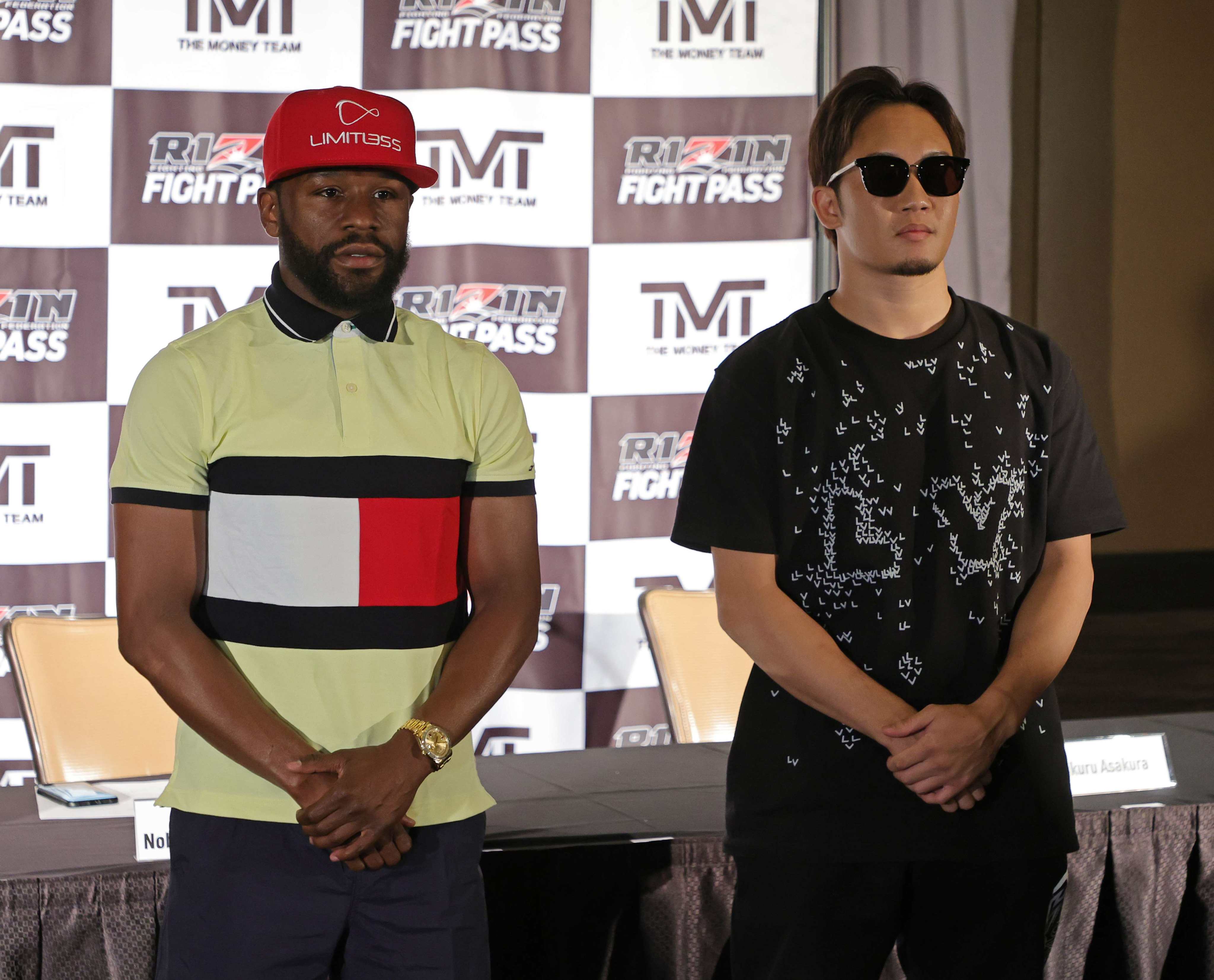 Floyd Mayweather Jnr (left) and mixed martial artist Mikuru Asakura pose during a news conference announcing their exhibition boxing bout at The M Resort on June 13, 2022 in Henderson, Nevada. The bout will take place in September 2022 in Japan as part of a Rizin Fighting Federation show. Photo: AFP