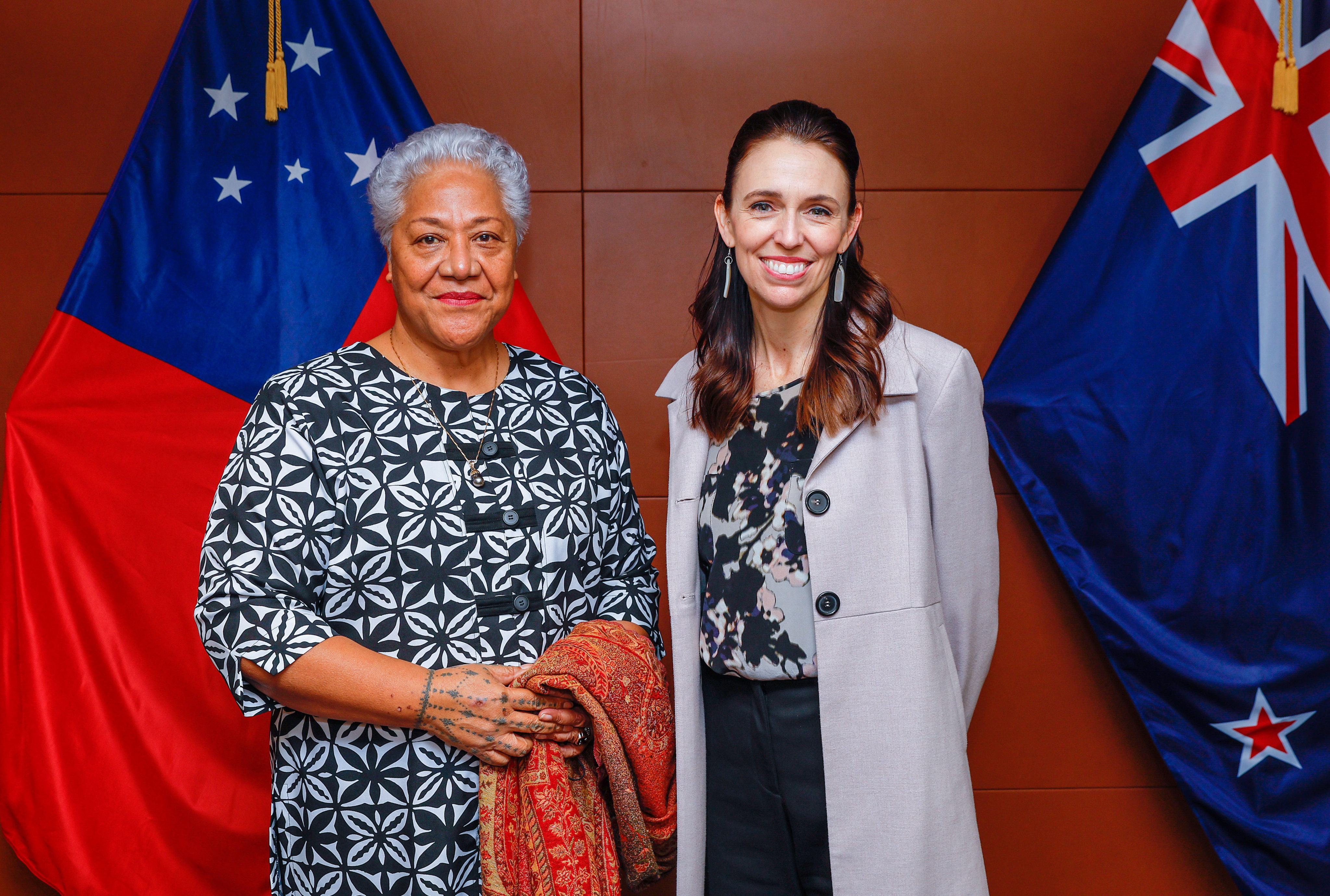 Samoa’s Prime Minister Fiame Naomi Mata’afa, left, and New Zealand Prime Minister Jacinda Ardern pose for a photo before a bilateral meeting in Wellington, New Zealand, on Tuesday, June 14, 2022. Photo: Pool via AP