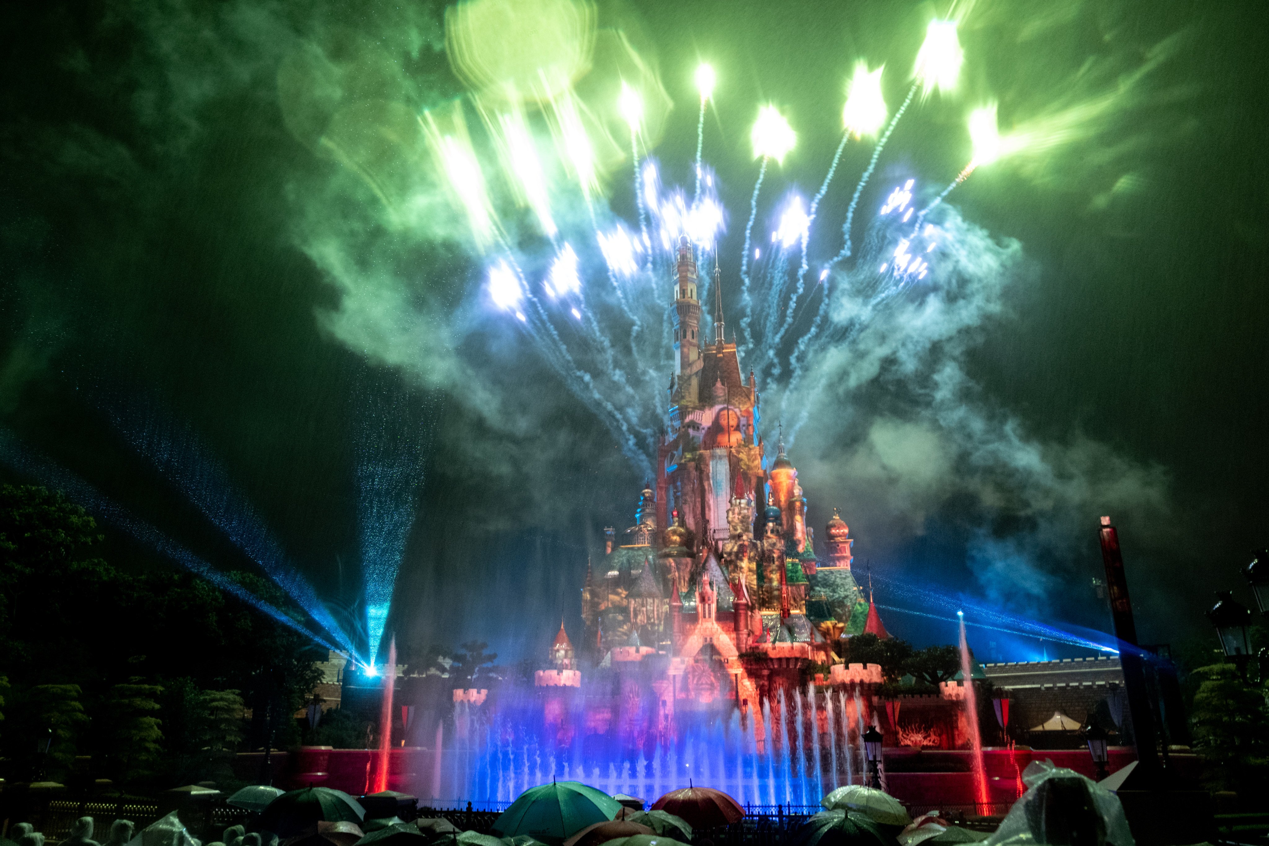 Hong Kong Disneyland debuts its new fireworks display, Momentous, which lights up the sky above the new Castle of Magical Dreams. Photo: Connor Mycroft 