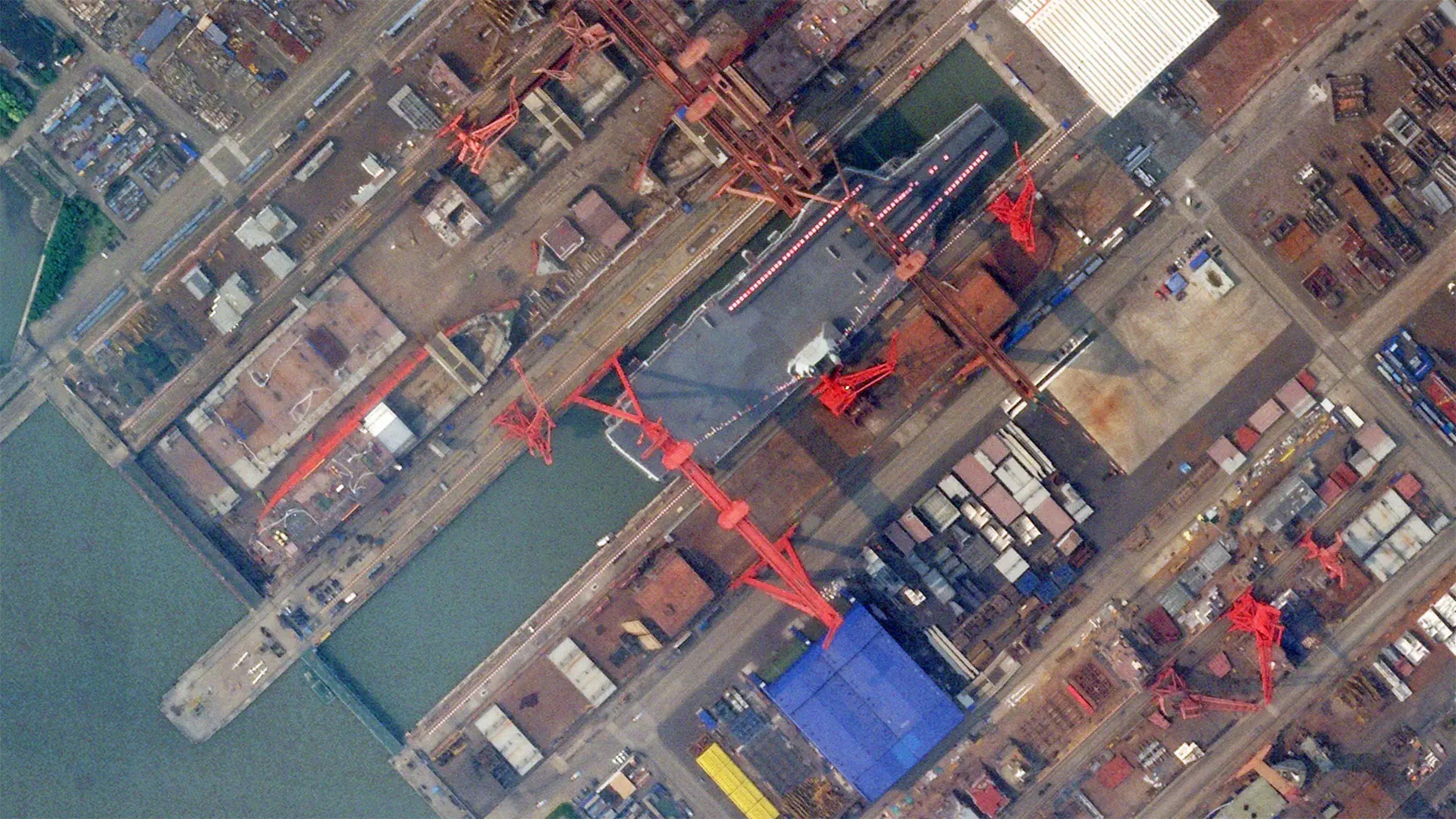 A satellite image of the Jiangnan shipyard in Shanghai, taken on Tuesday, shows the dry dock has been flooded. Photo: Planet Labs