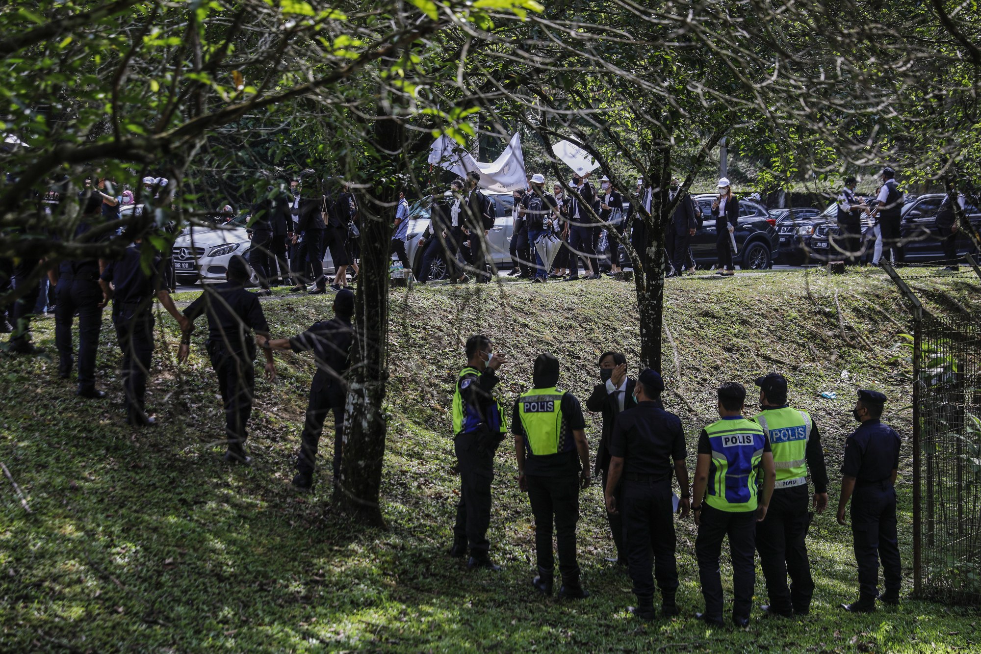 Malaysian police block lawyers wanting to walk to Kuala Lumpur’s parliament building during a Friday protest aimed at upholding judicial independence. Photo: EPA-EFE