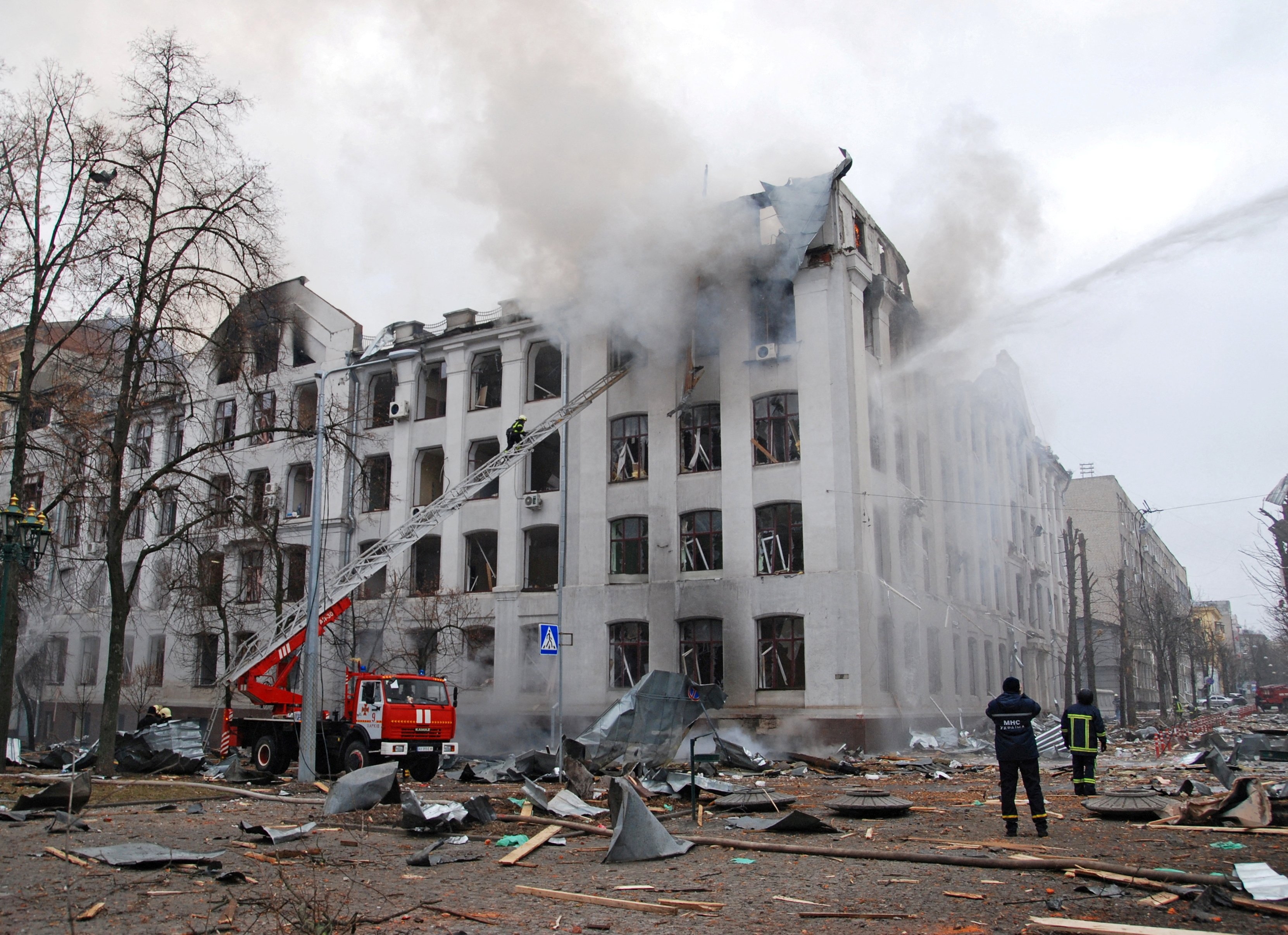 Firefighters put out a blaze at the Kharkiv National University building, in Ukraine, which city officials said was damaged by shelling, on March 22. Photo: Reuters