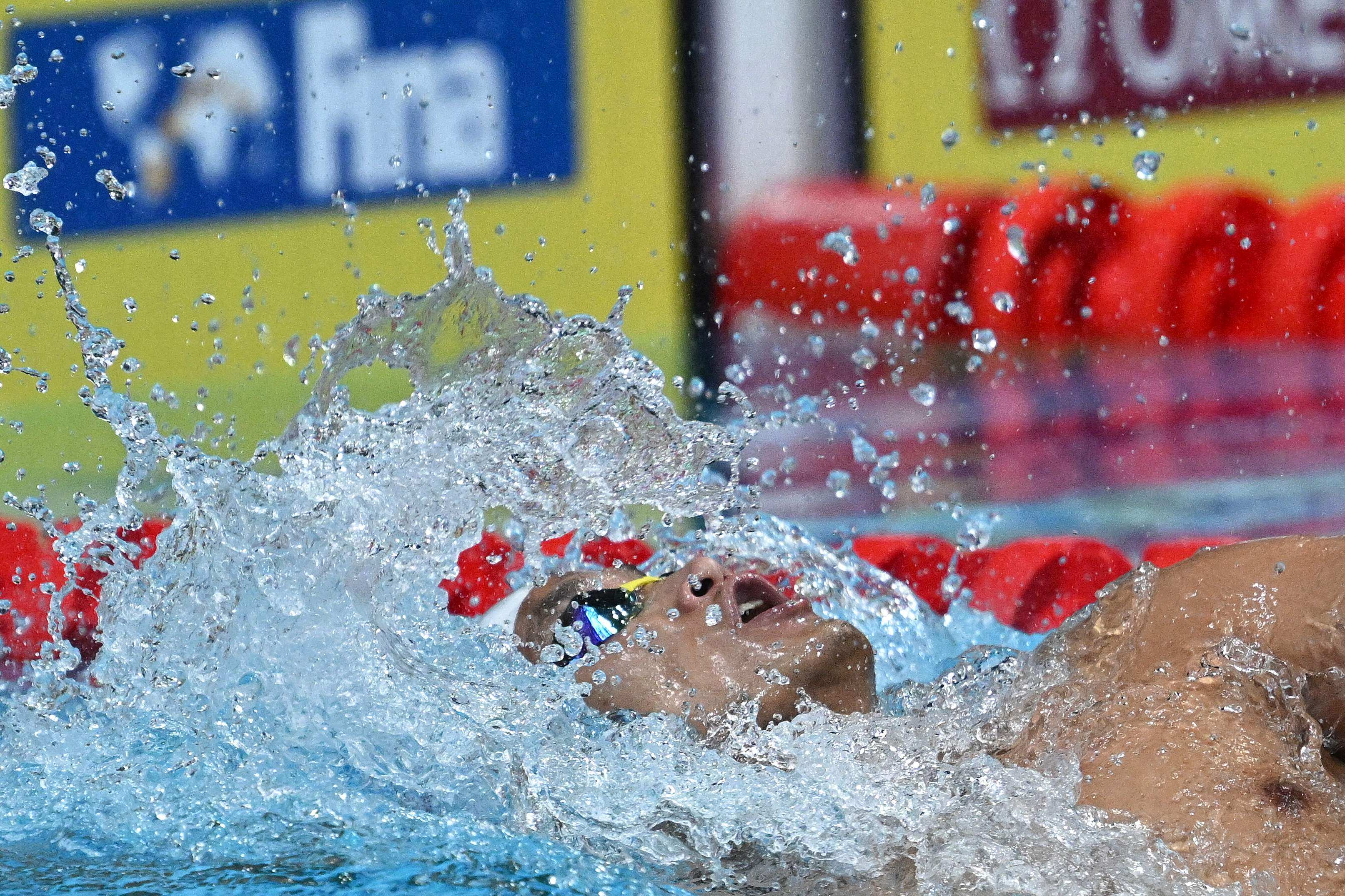 Hong Kong’s Lau Shiu-yue competes in a heat for the men’s 100m backstroke event during the Budapest 2022 World Aquatics Championships at Duna Arena. Photo: AFP