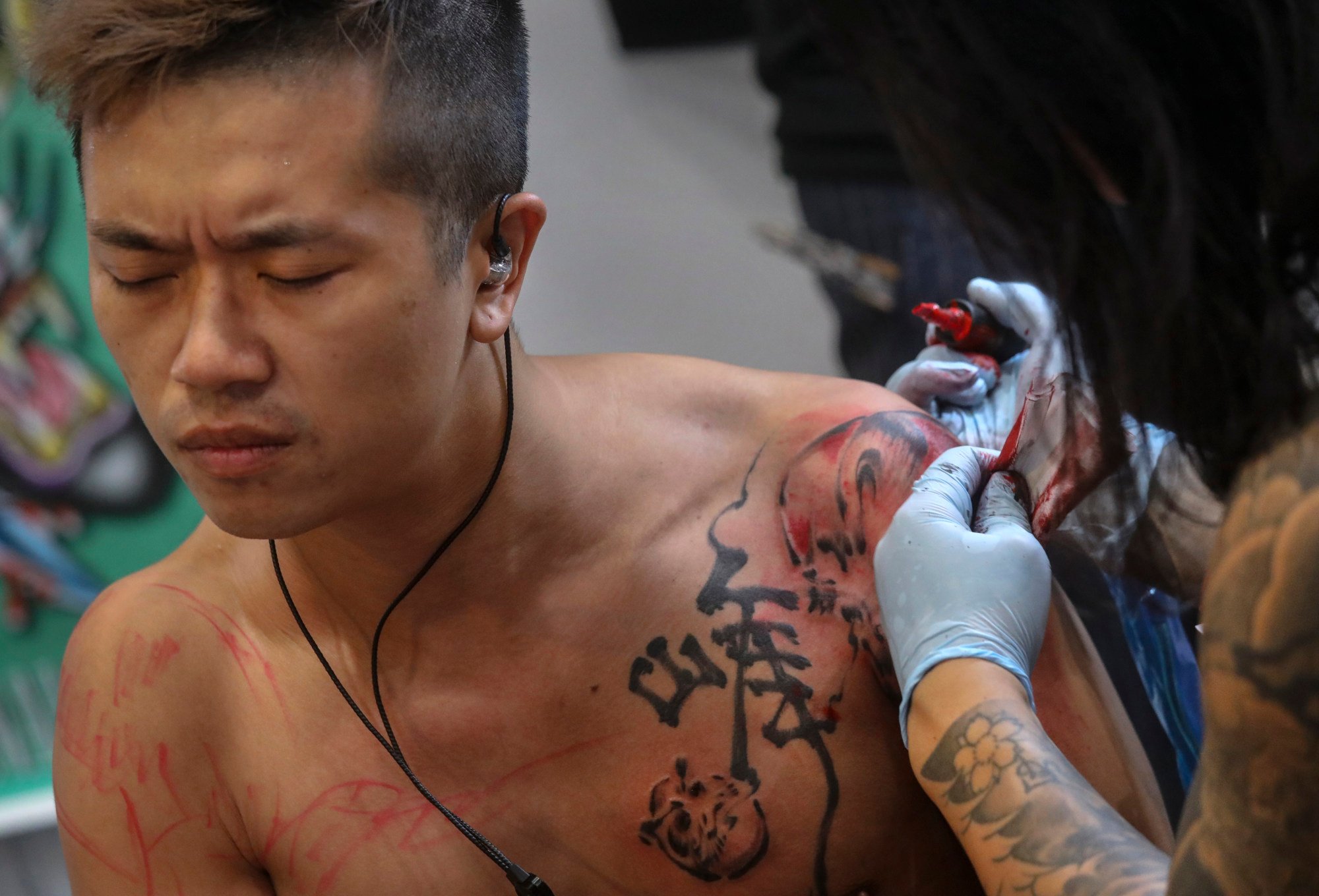 China's tattoo ban for minors criticised as circular logic and irrational fear of difference, but many welcome new rules