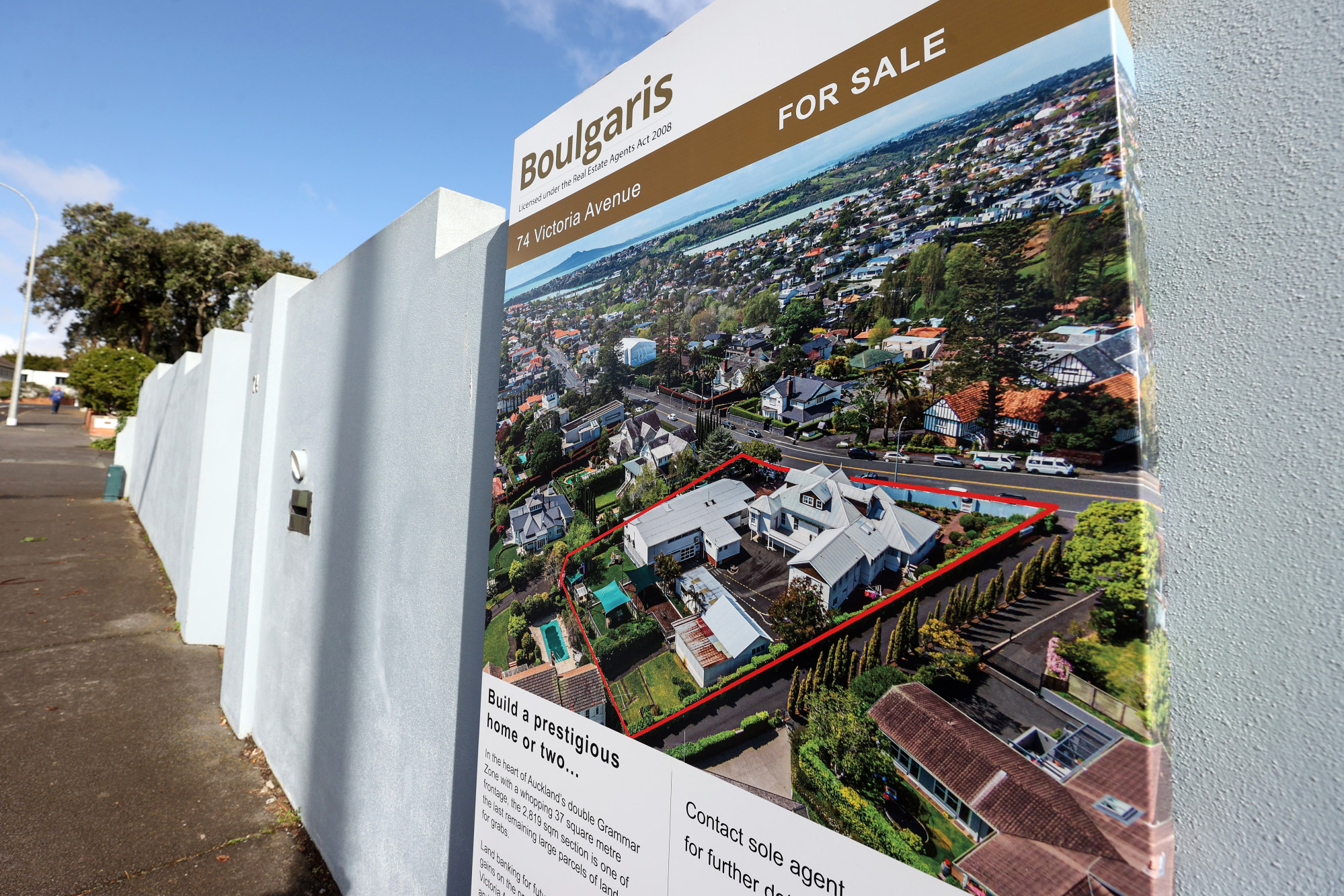 An advertisement for a residential property in Auckland on June 13. The New Zealand government has empowered the central bank to make house price stability a top priority. Photo: Bloomberg