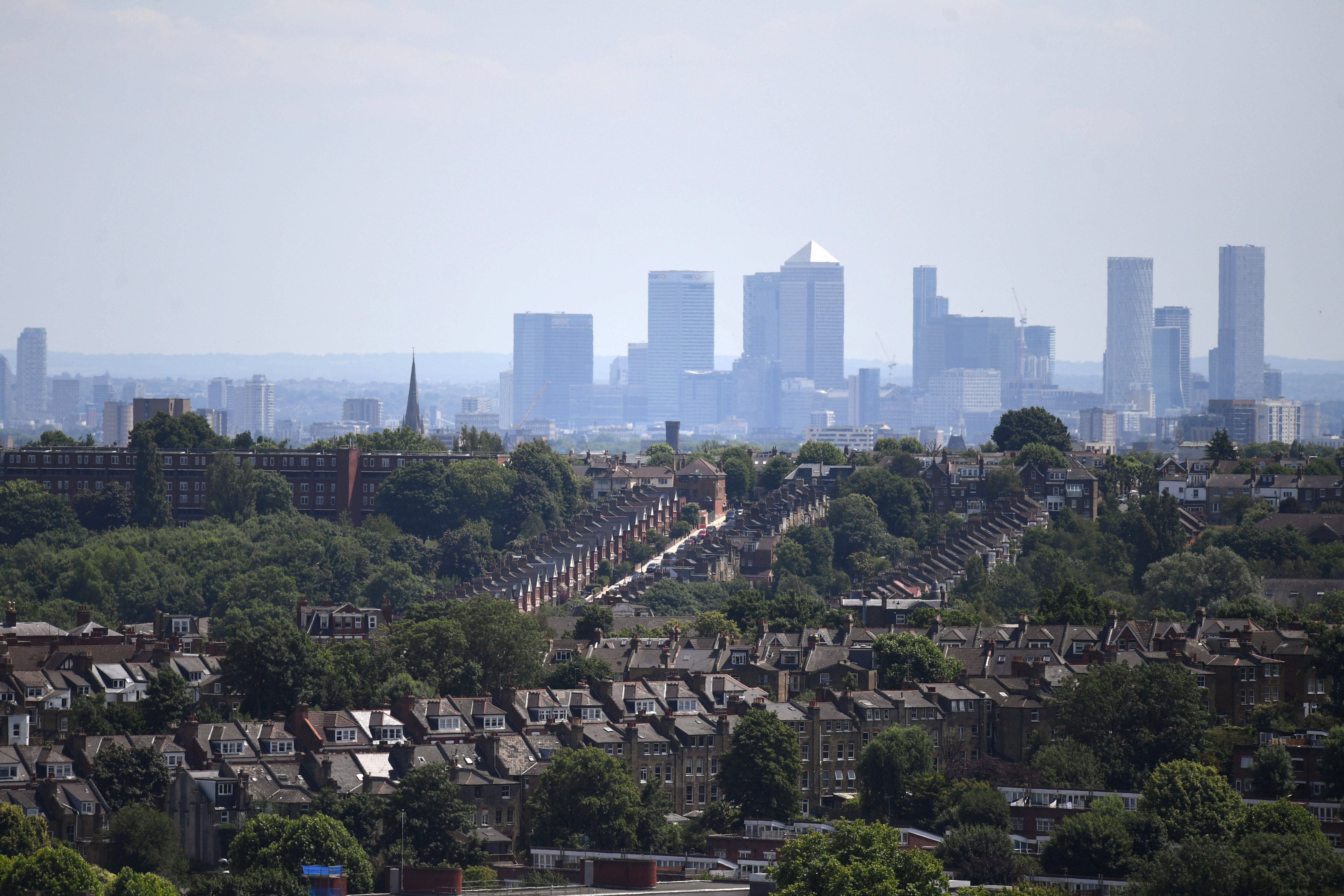 Residential houses by the City of London skyline on June 16,2022. Photo: EPA-EFE