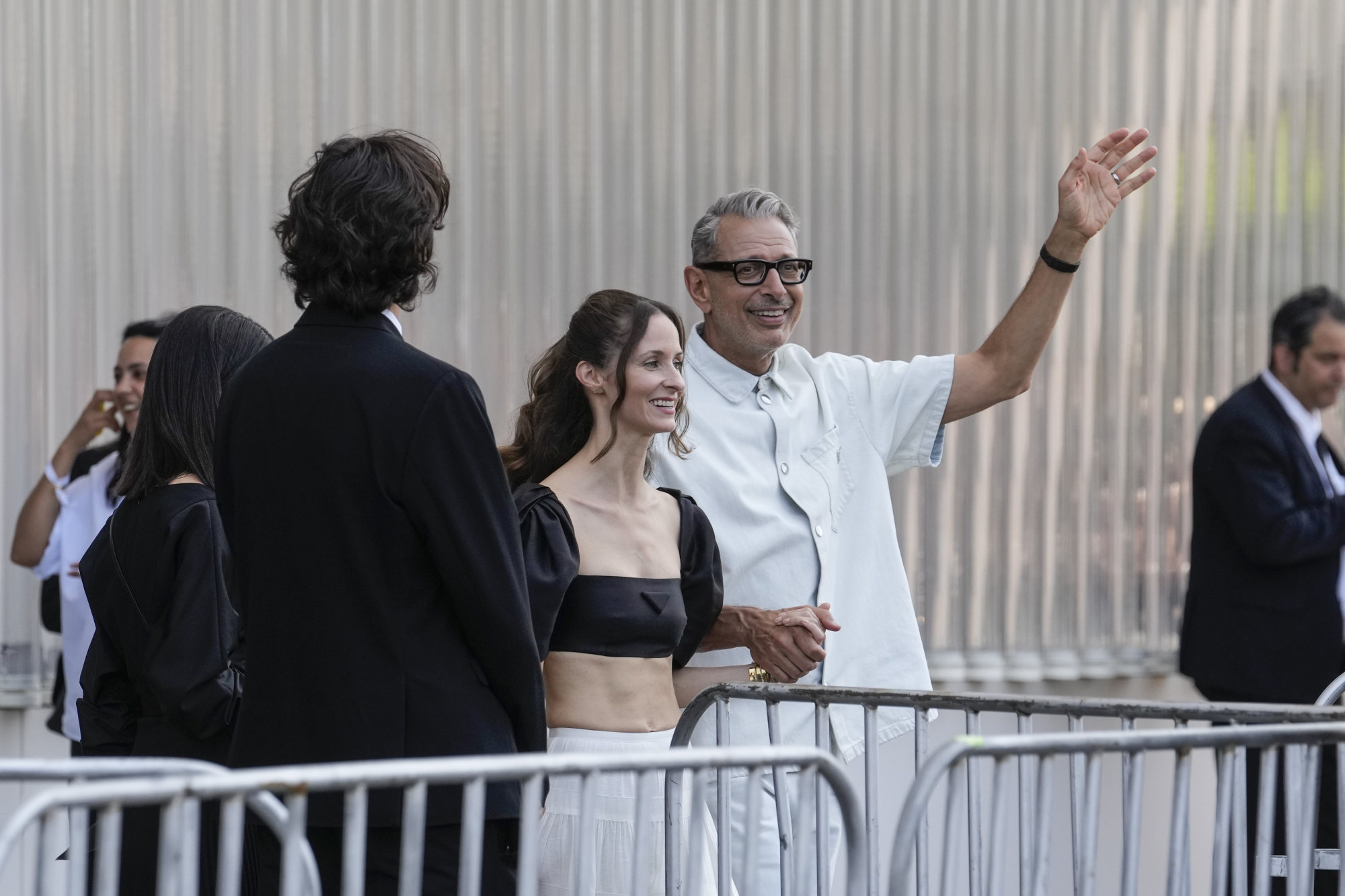 Jeff Goldblum (right) and Emilie Livingston depart from the Prada men’s spring/summer 2023 collection presented in Milan, Italy, on June 19. Photo: AP Photo