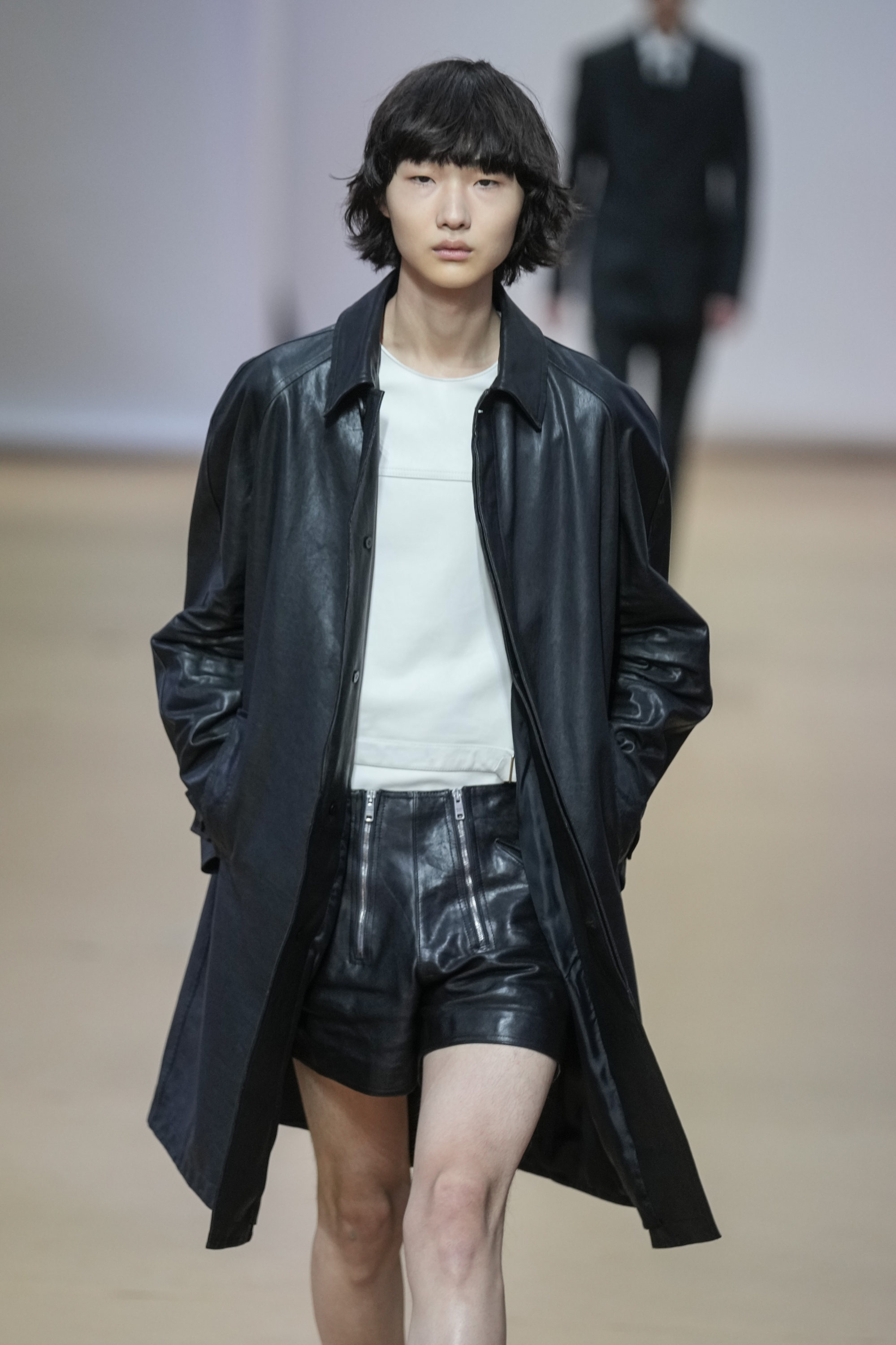 MILAN - JANUARY 13: Man with white leather Prada bag and black and white  jacket before Marni fashion show, Milan Fashion Week street style on  January Stock Photo - Alamy