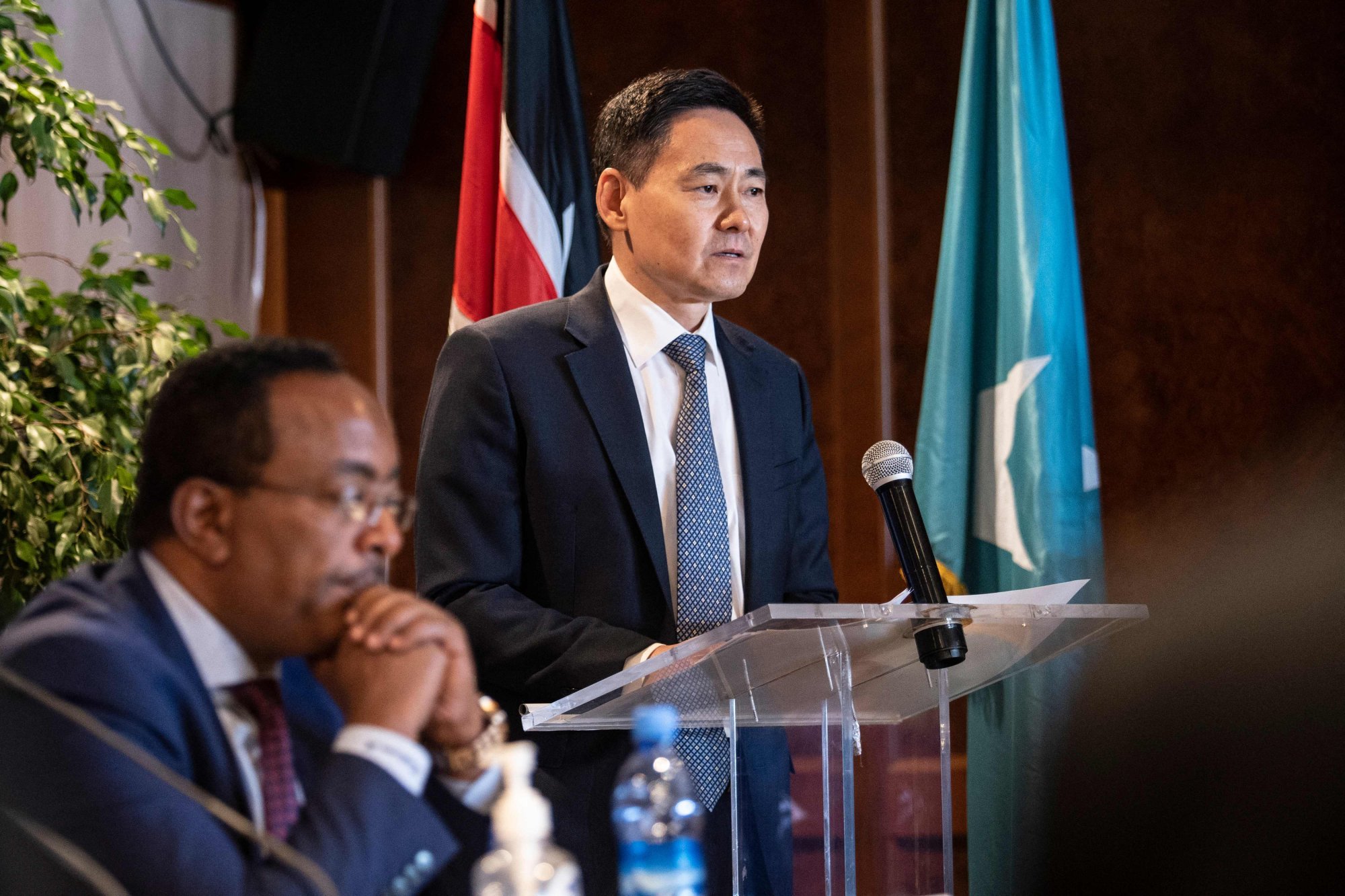 Xue Bing speaks as Redwan Hussein, national security adviser to the Ethiopian Prime Minister Abiy Ahmed, listens at the peace and governance conference organised by Beijing. Photo: AFP