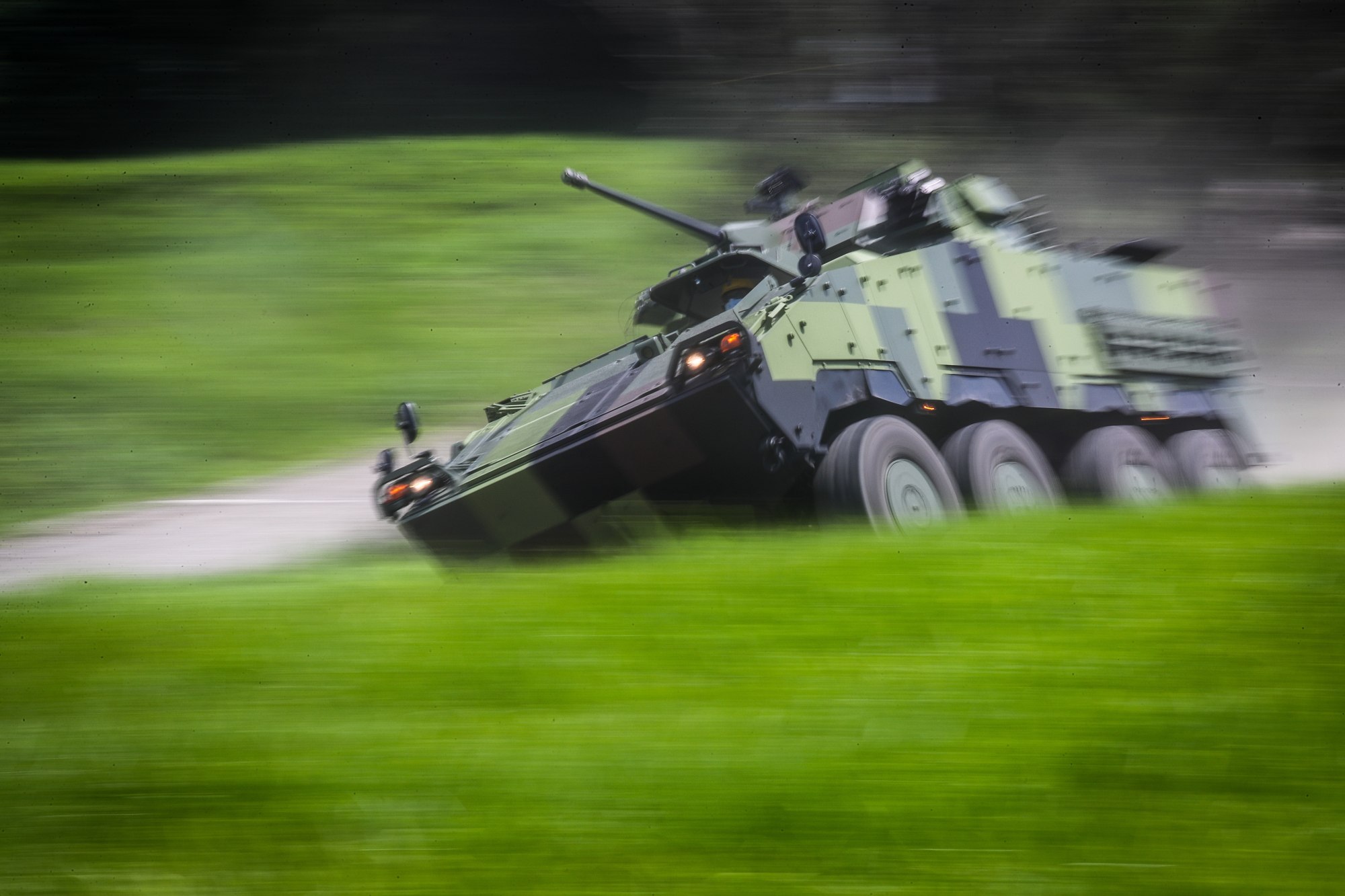One of Taiwan’s CM-34 armored vehicles maneuvers during a demonstration inside a military testing facility in Nantou county, central Taiwan, on Thursday. Photo: EPA-EFE