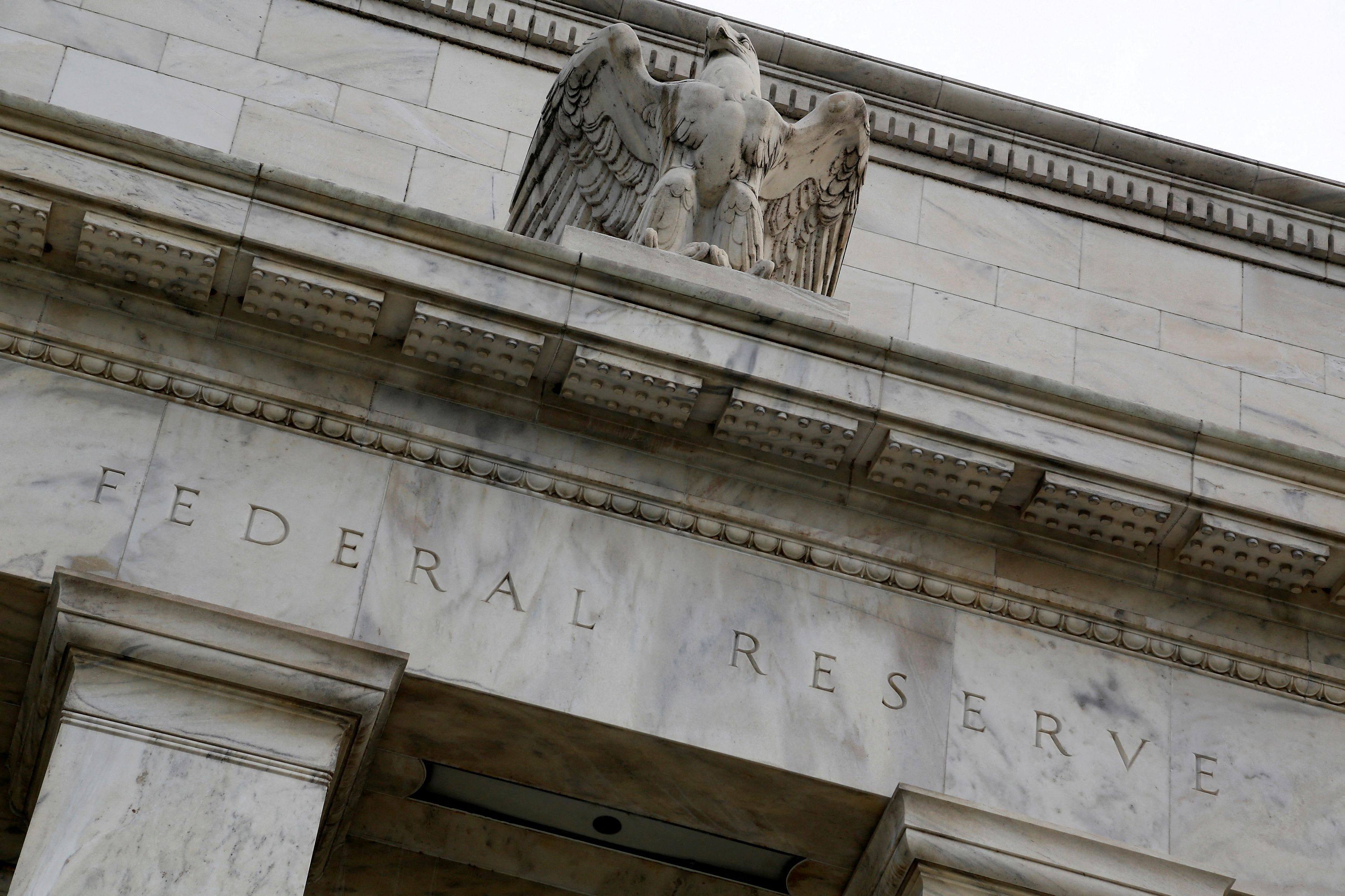 An eagle sits atop the US Federal Reserve building’s facade in Washington. Photo: Reuters
