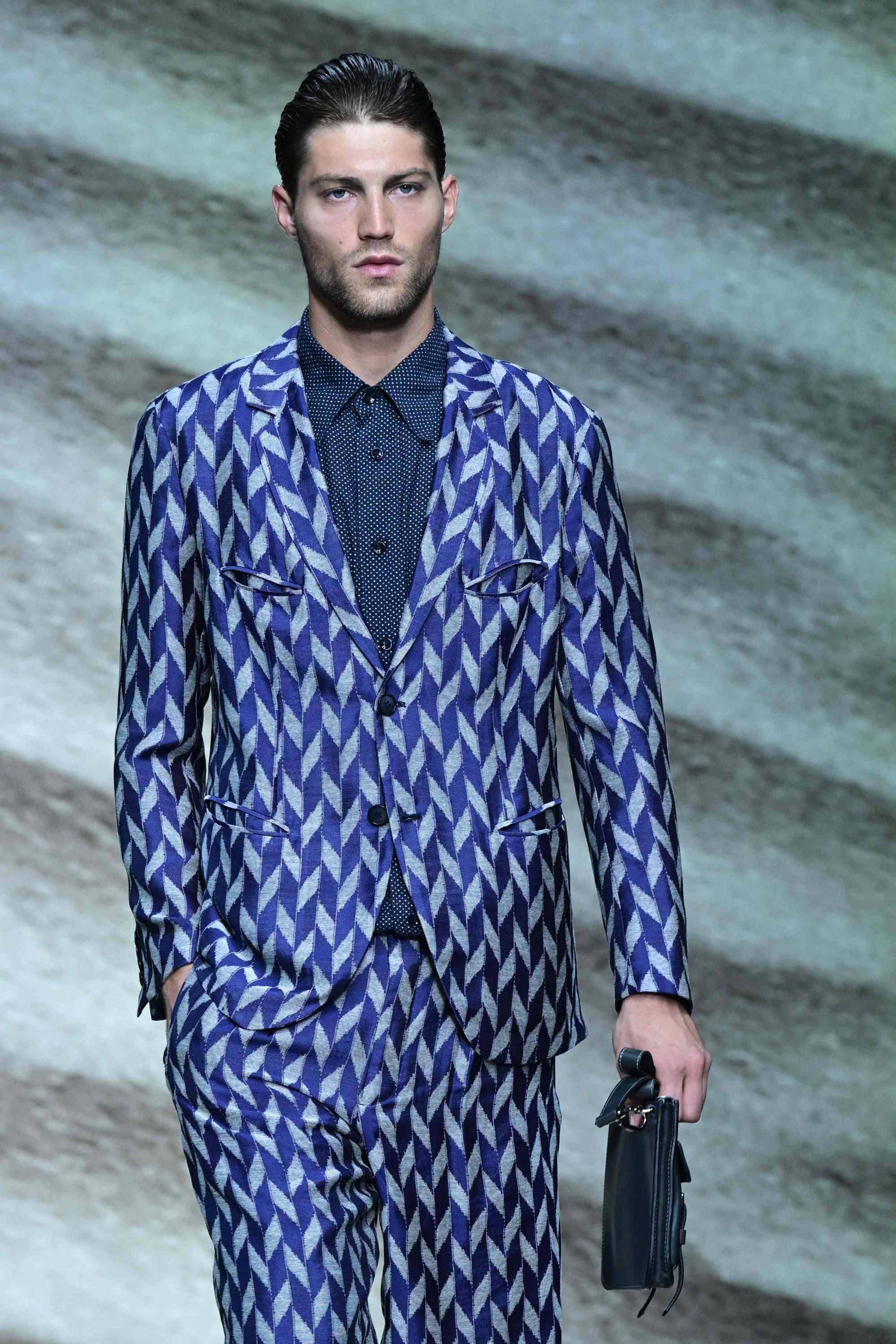 Milan Men's Fashion Week: Giorgio Armani mixed elegance with a touch of  whimsy through colour blocking and surprising prints for spring/summer 2023  in shades of blue