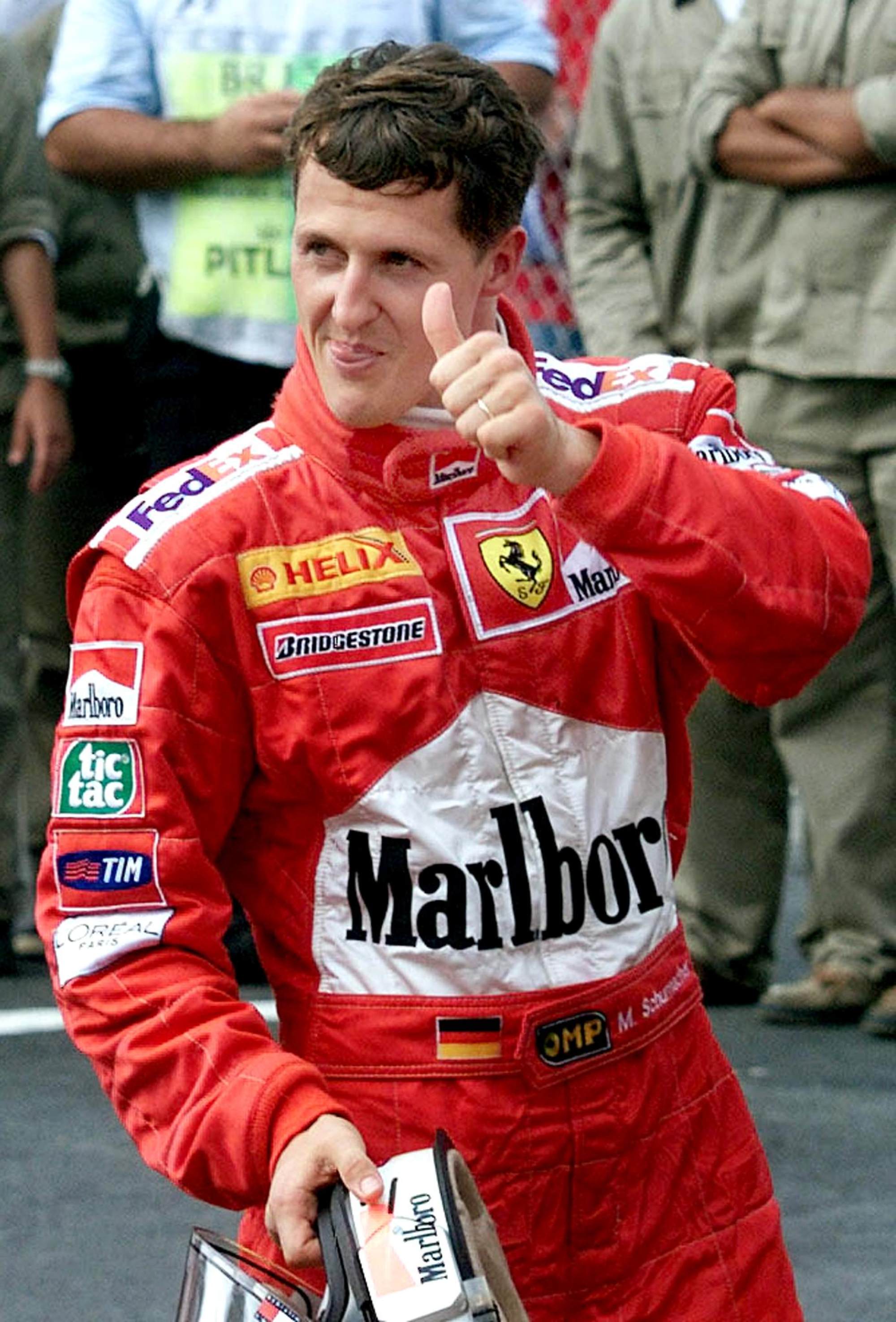 German Formula One world champion Michael Schumacher of Ferrari after winning the Brazil Grand Prix 26 in 2000. Photo: AFP