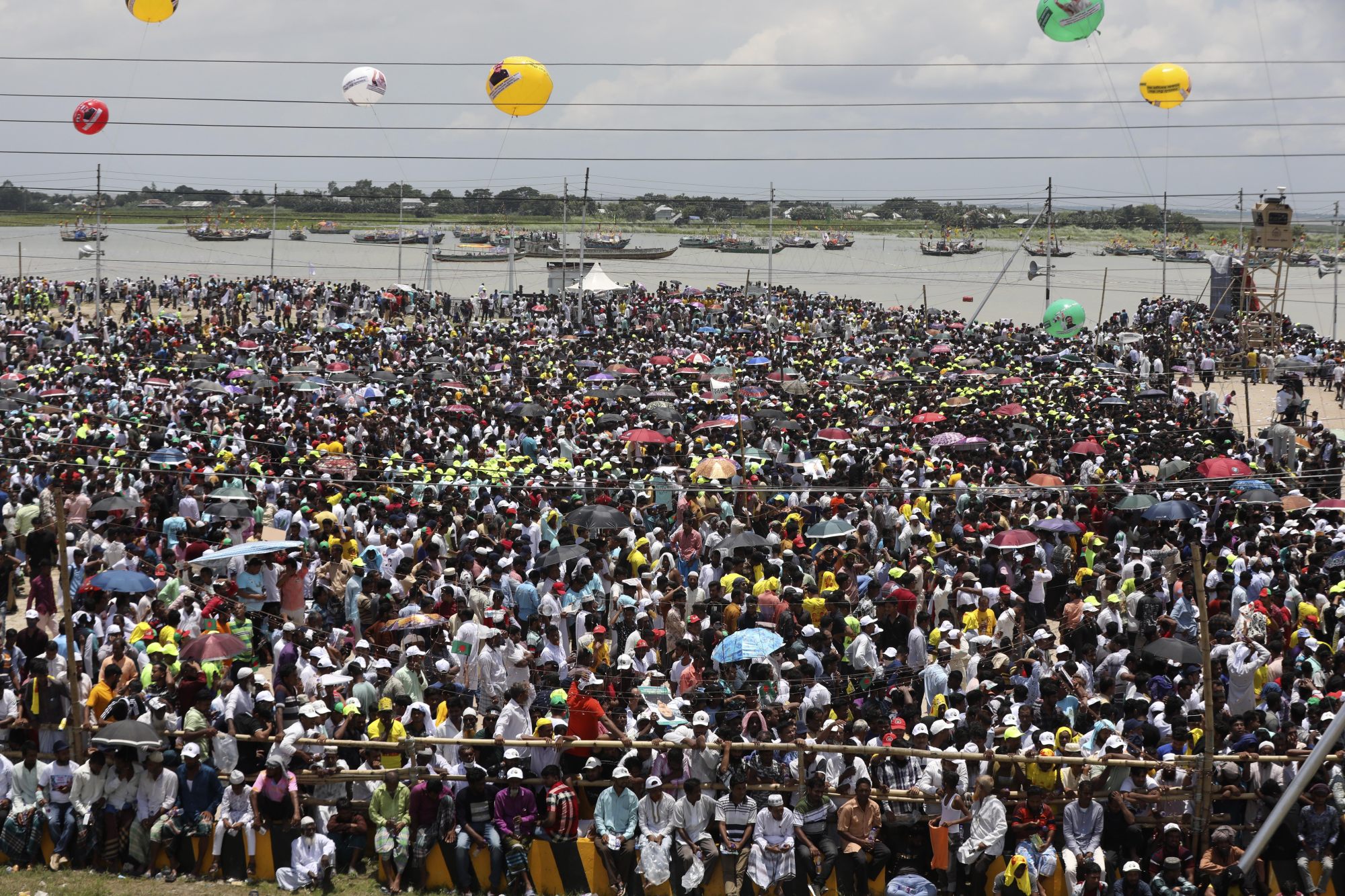 A crowd gathers to watch the opening of Bangladesh’s longest bridge. Photo: AP