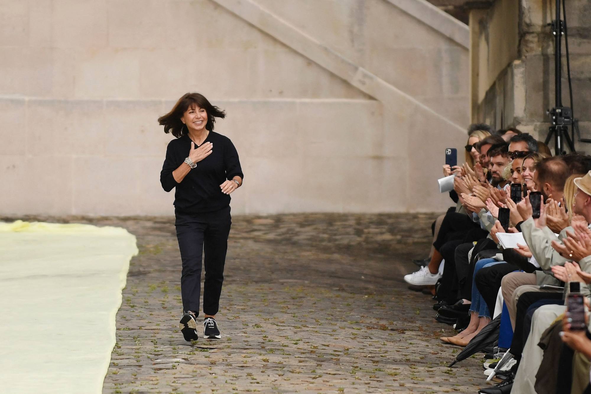 Hermès brought summer holiday vibes to Paris Fashion Week with pastel  colours and a contemporary take on Birkin's ancestor – the Haut à courroies  travel bag – for its menswear spring/summer 2023