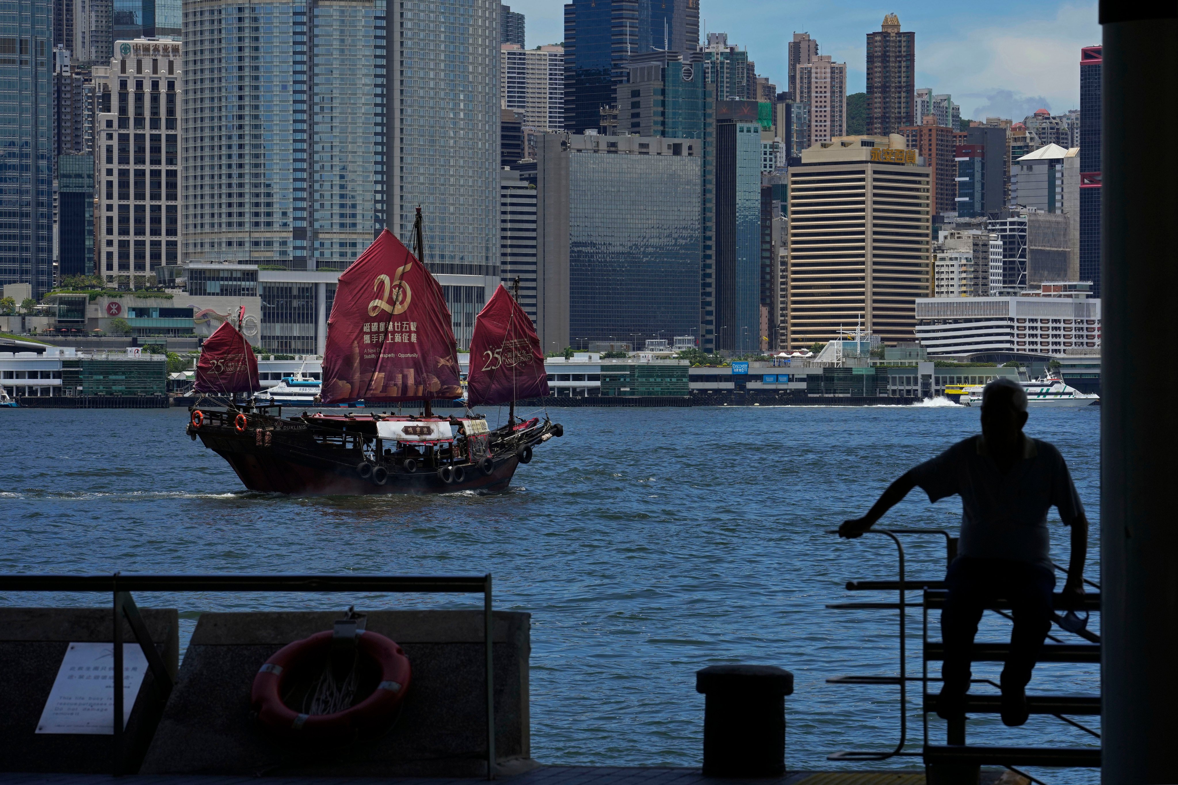 A Chinese junk sails across Victoria Harbour to mark the 25th anniversary of Hong Kong’s return to Chinese rule. Photo: AP