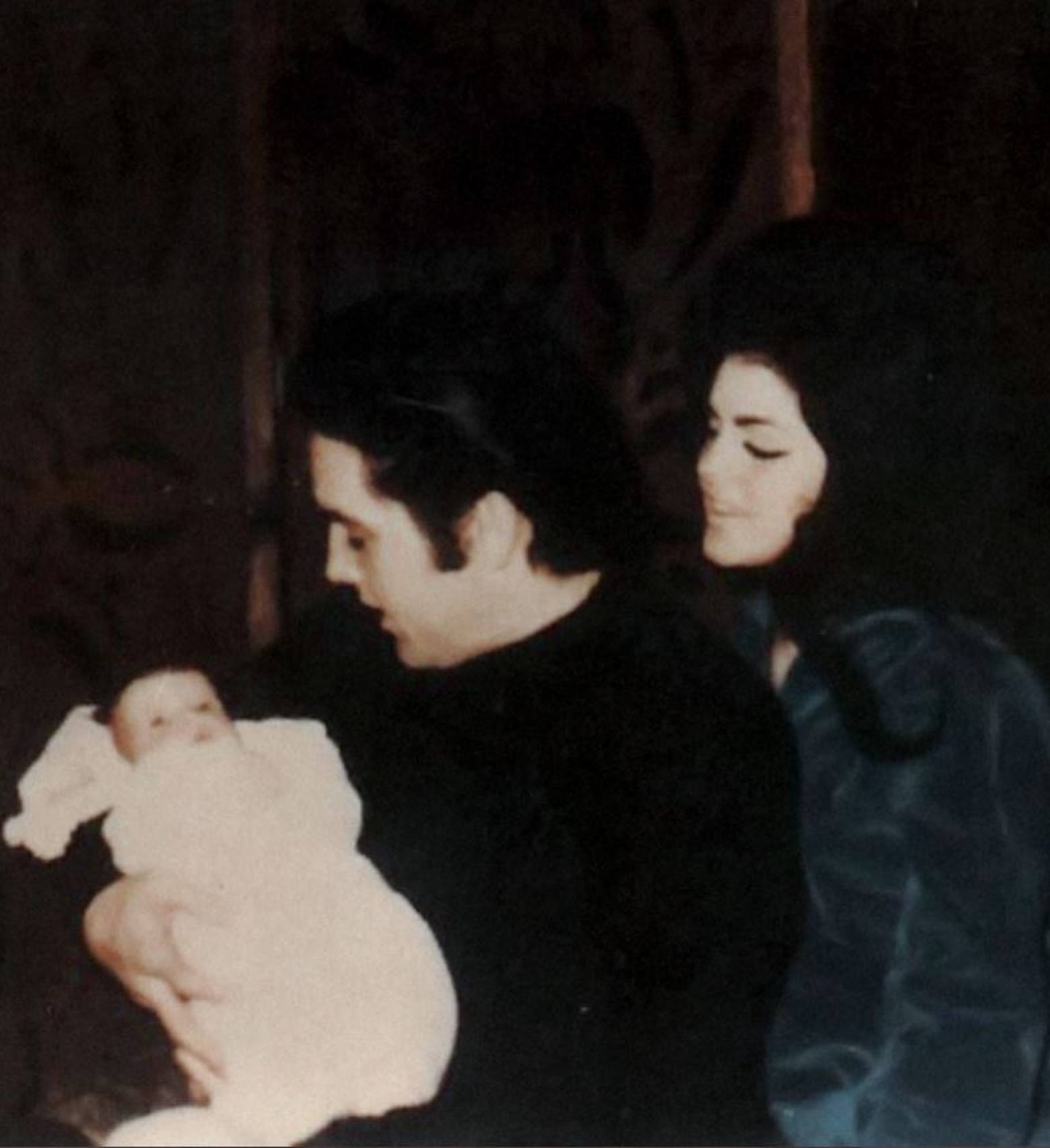 Elvis Presley with baby Lisa Marie and Priscilla at Graceland, in 1968. Photo: @presleyarchive/Twitter