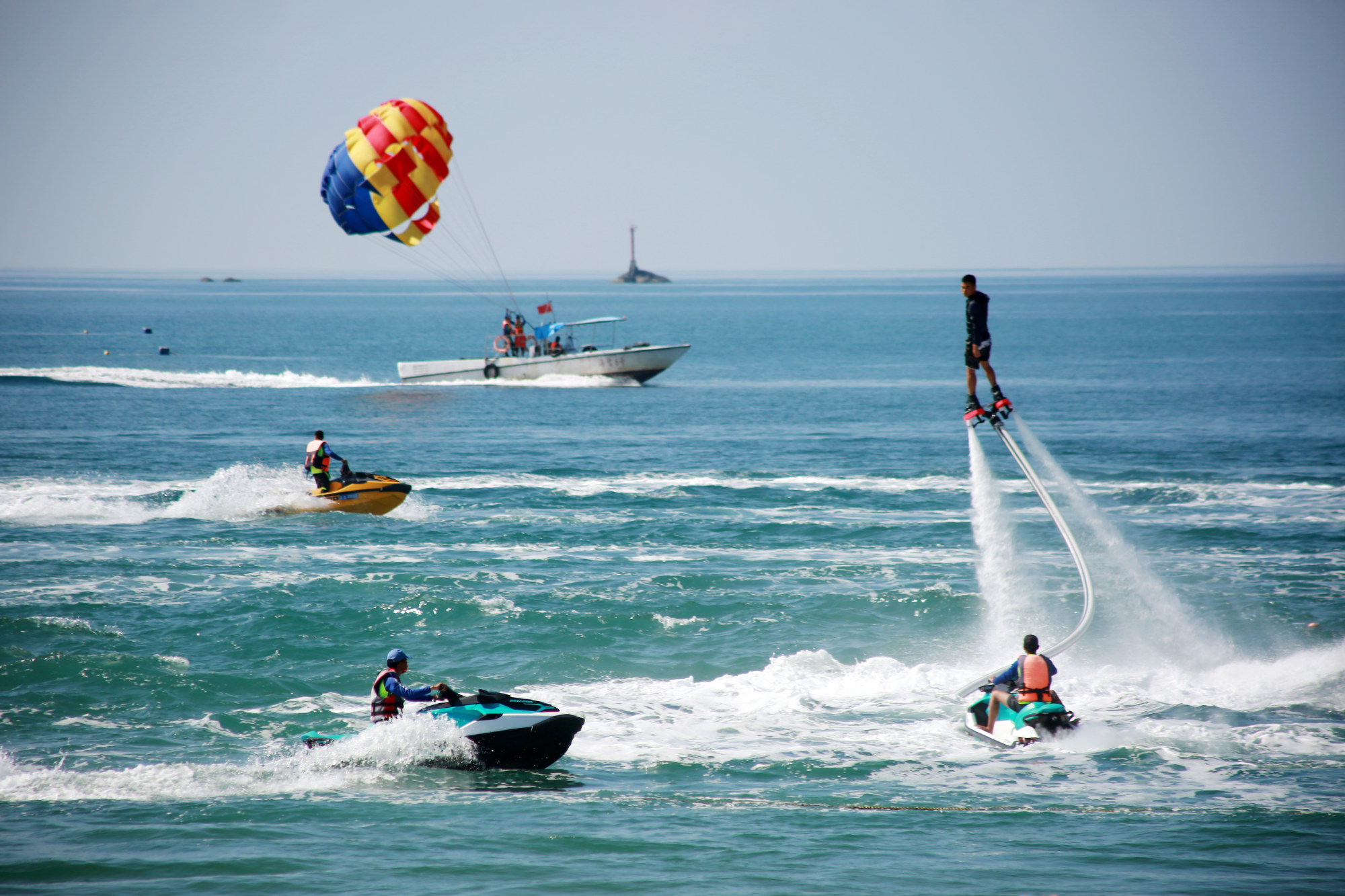 Tourists enjoy themselves at Tianya Haijiao in Sanya, Hainan province, on China’s National Day on October 1, 2021. Photo: Getty Images