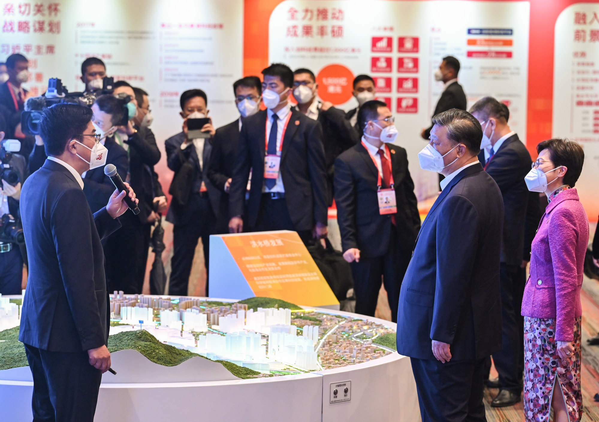Government minister Michael Wong (left) briefs the president on a new development area. Photo: Handout